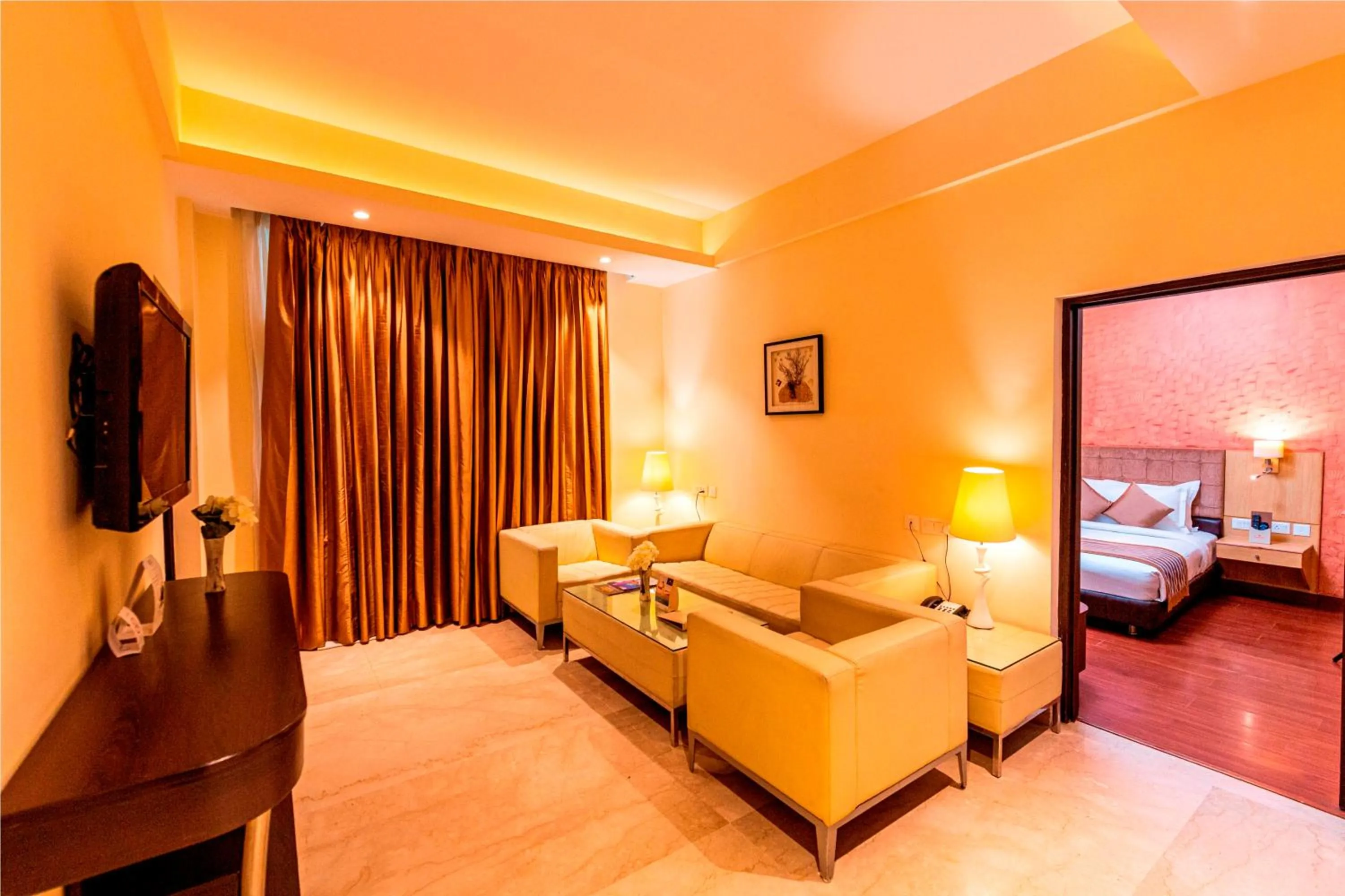 Living room, Bed in Ramada Neemrana