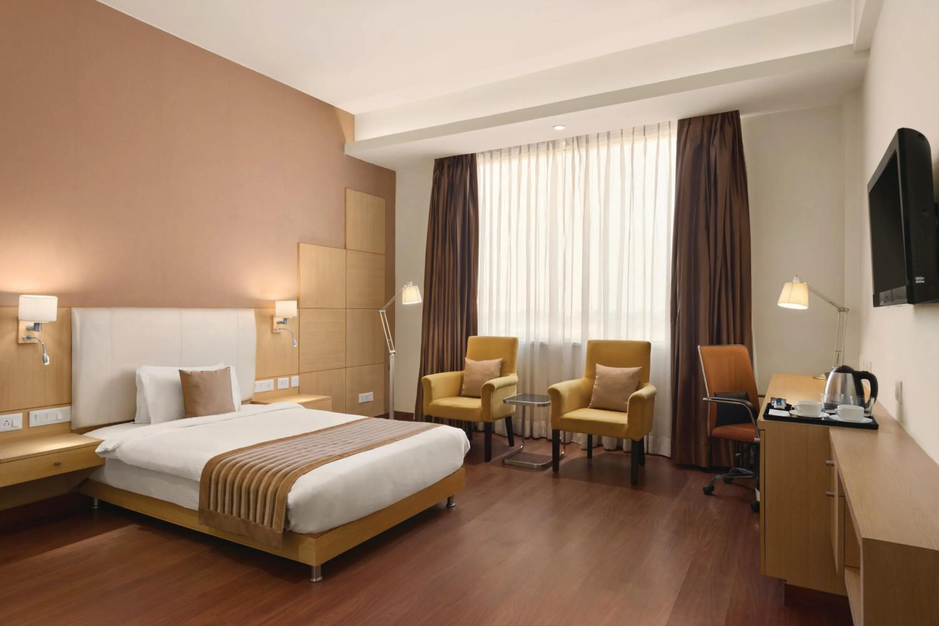 Photo of the whole room, Bed in Ramada Neemrana