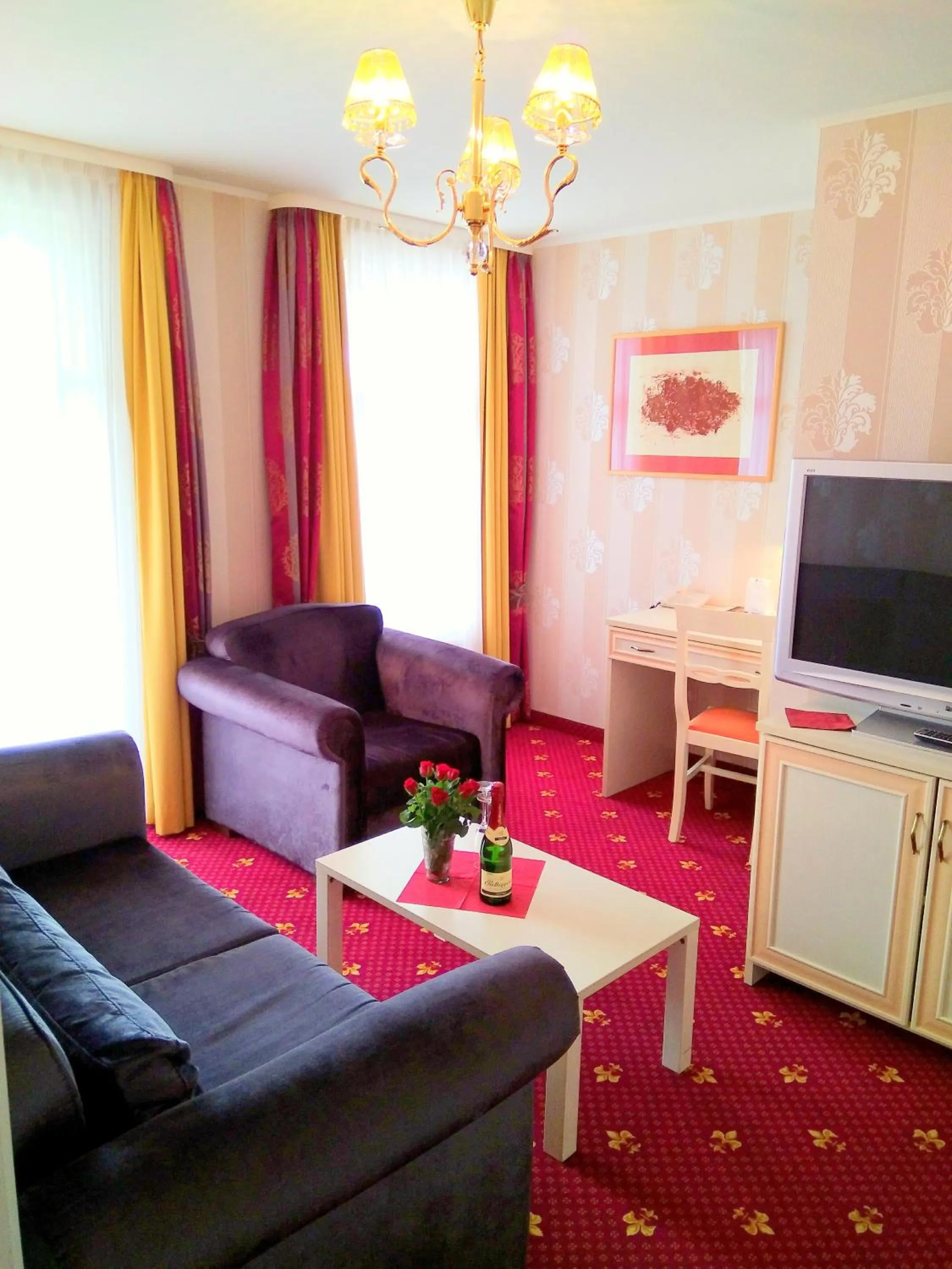 Living room in Alexa Hotel