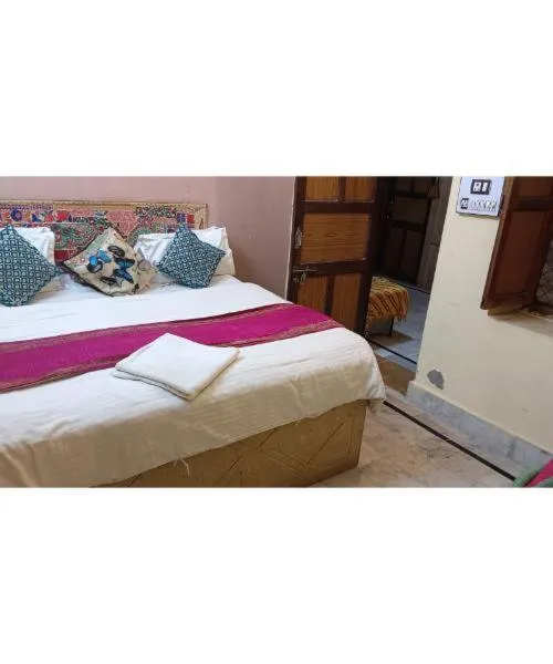 Bed in Hotel Neem Haveli