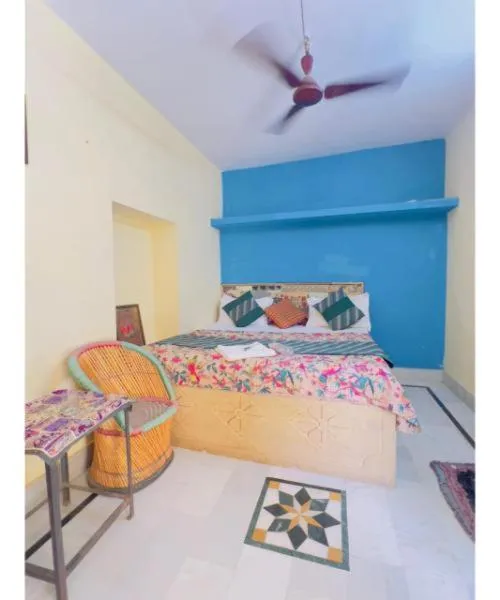 Bed in Hotel Neem Haveli