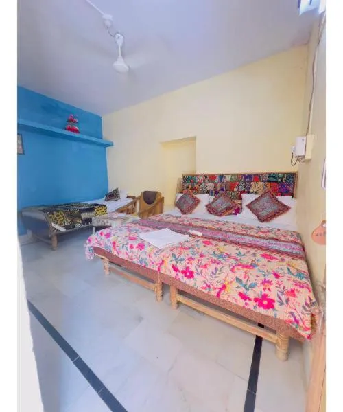 Bed in Hotel Neem Haveli