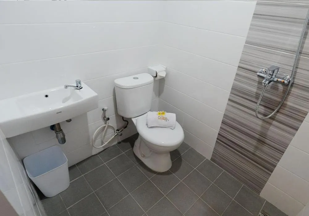 Bathroom in Cozzy Stay Hotel Semarang by Sinergi