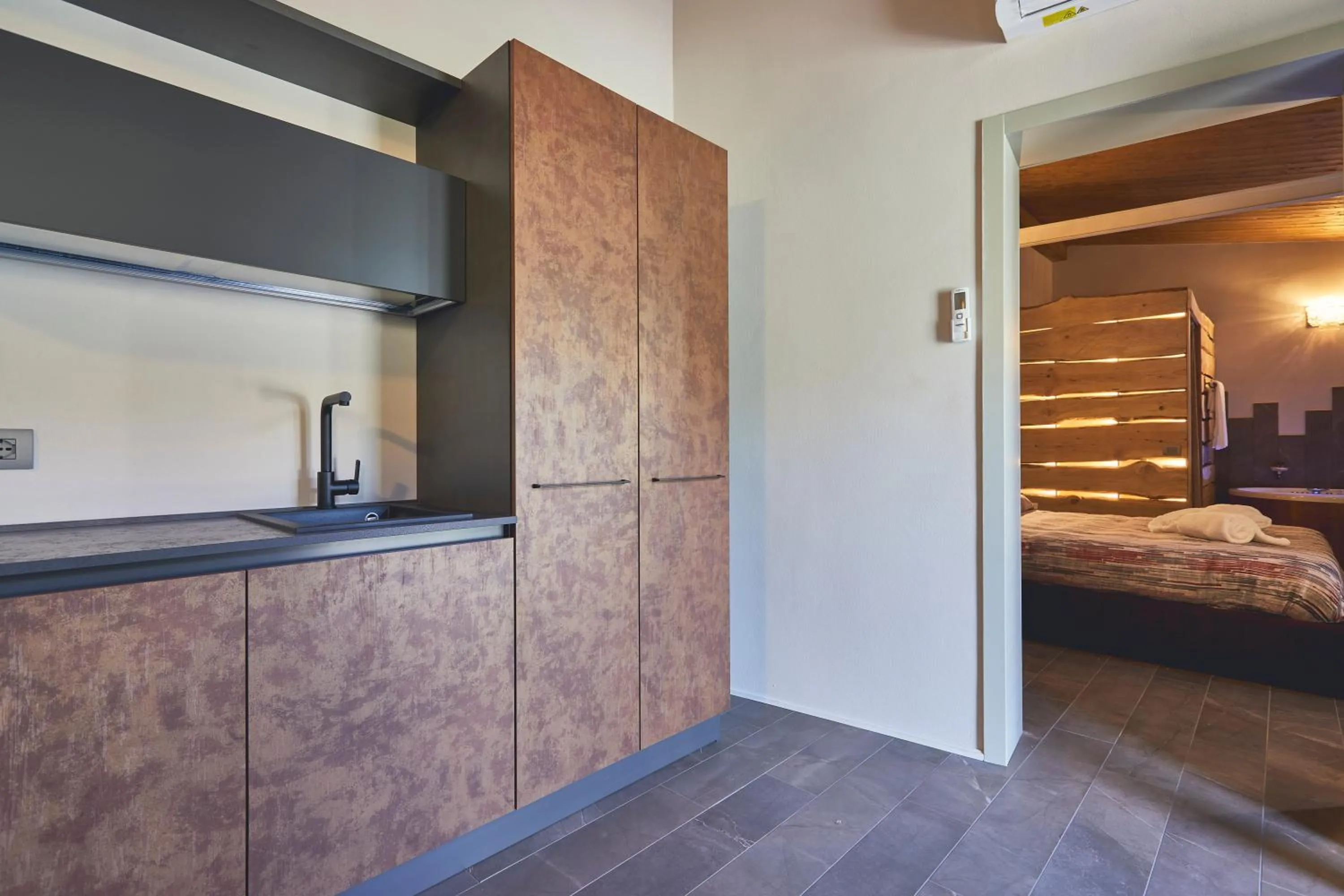 Bed in Le Stagioni Luxury Suite