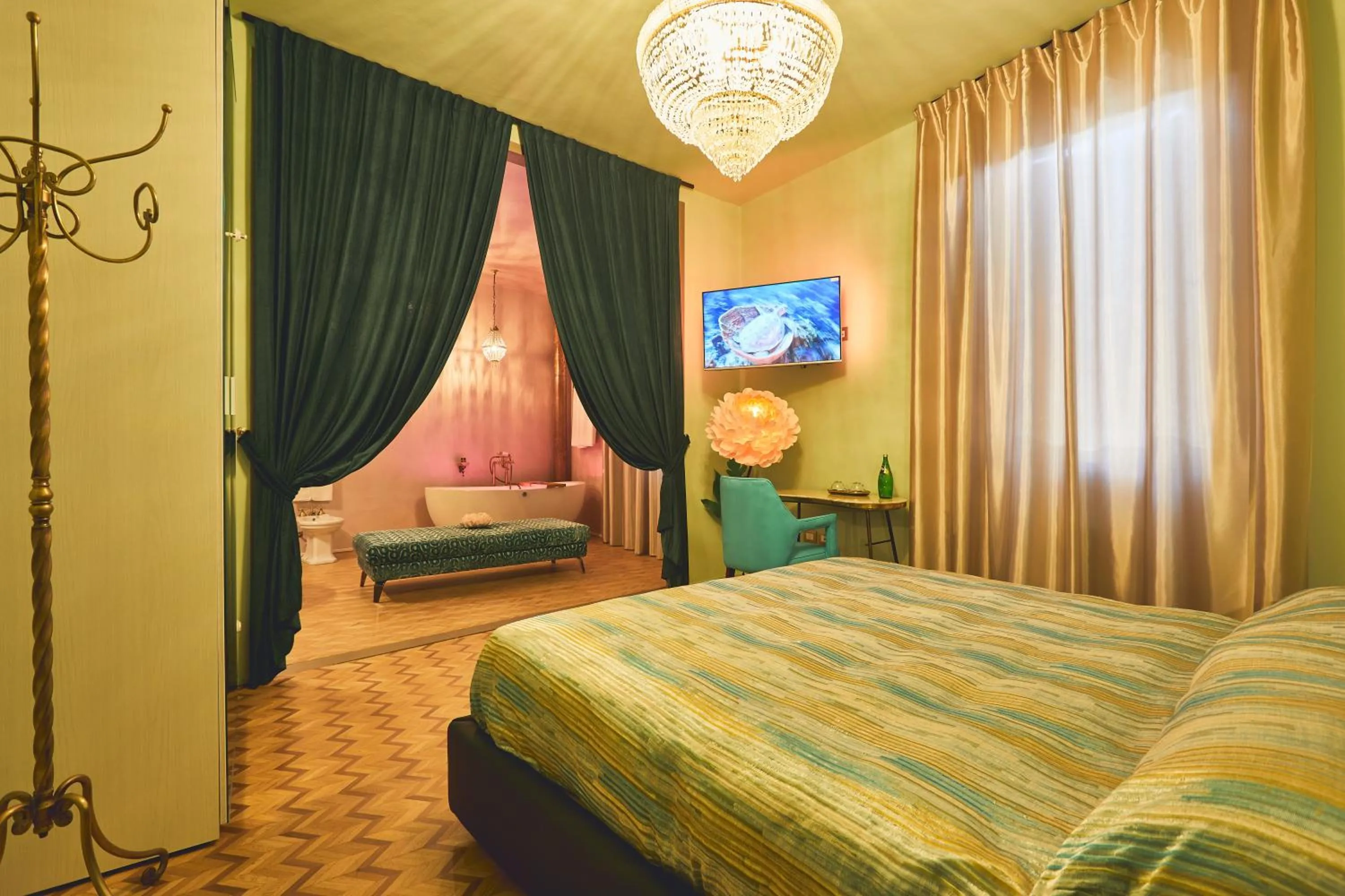 Bed in Le Stagioni Luxury Suite