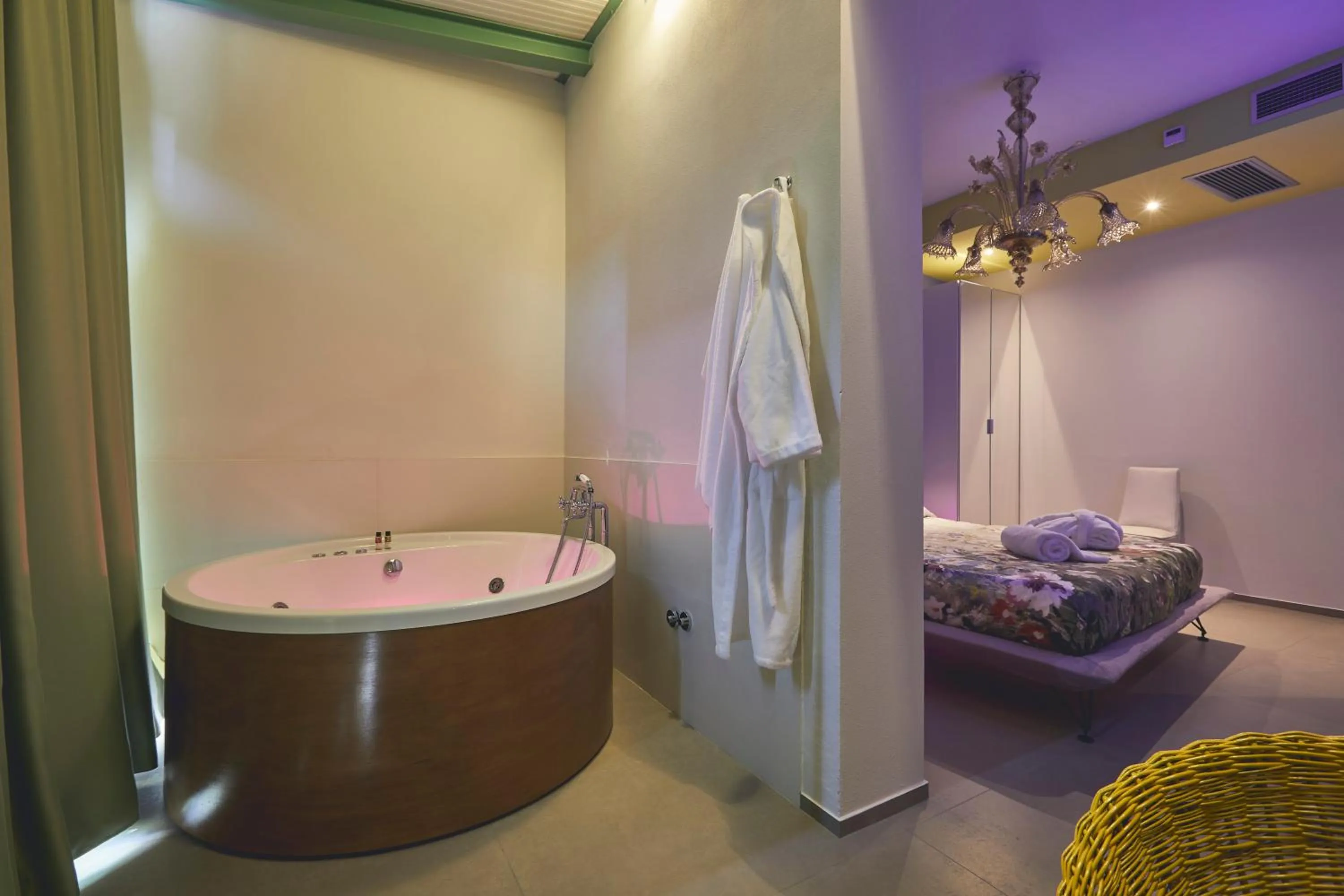 Bed in Le Stagioni Luxury Suite