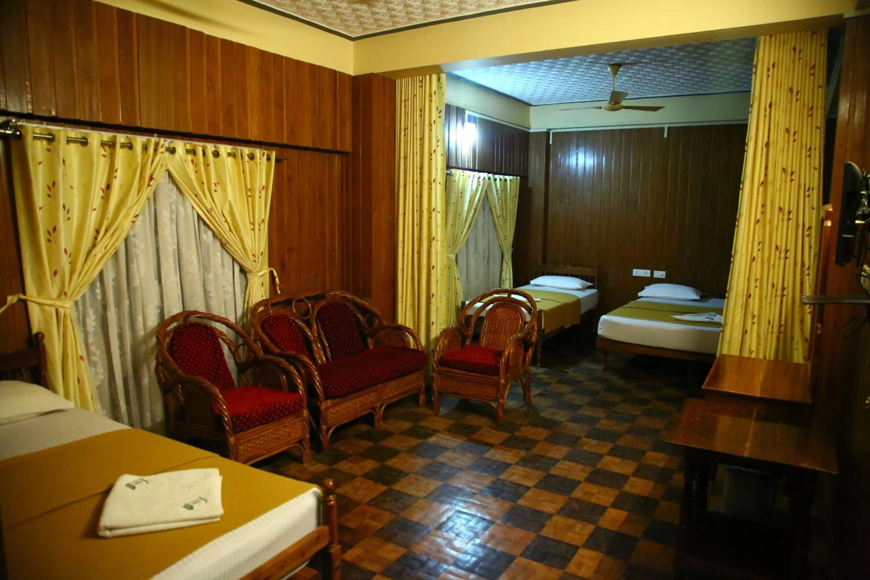 Bed in Lake Palace Family Resort Kumarakom