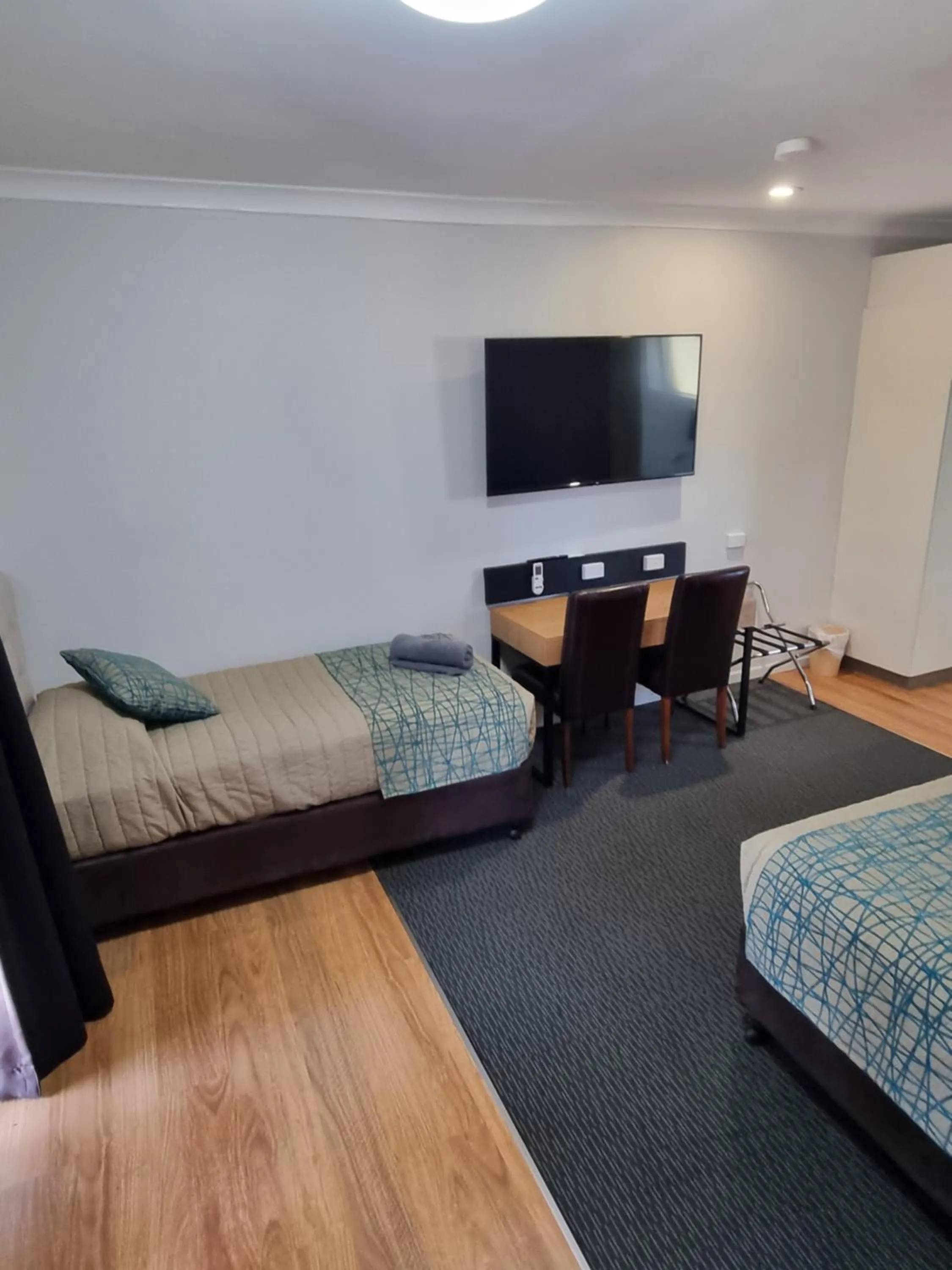 Bed in Australian Homestead Motor Lodge