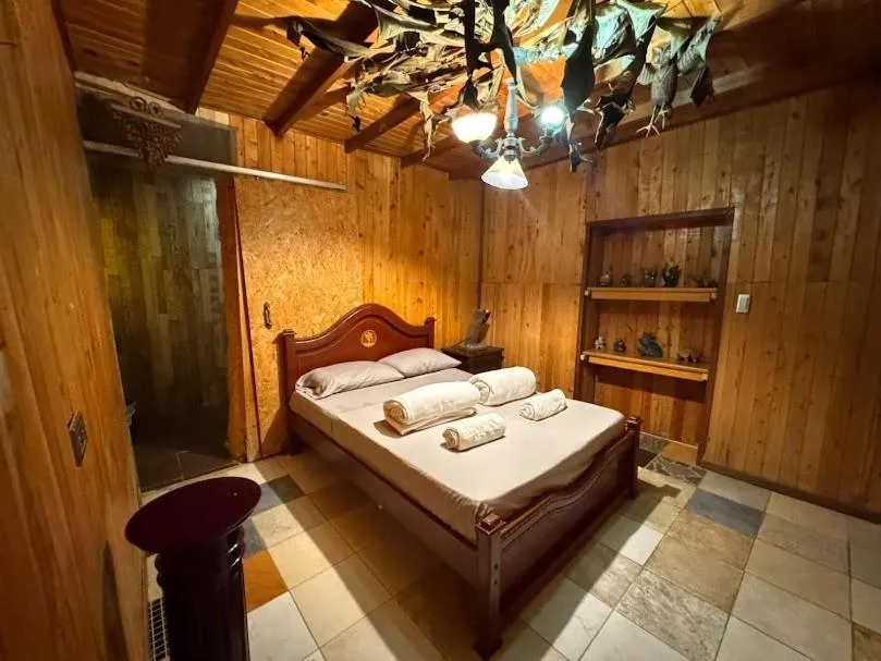 Bed in BioHotel Ecohouse