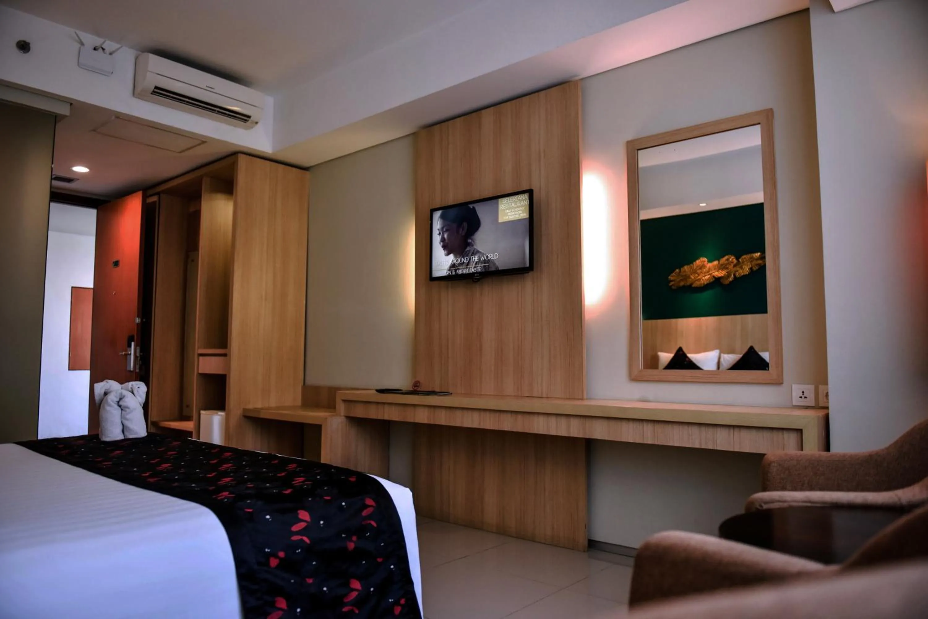 Bed in The Kana Kuta Hotel