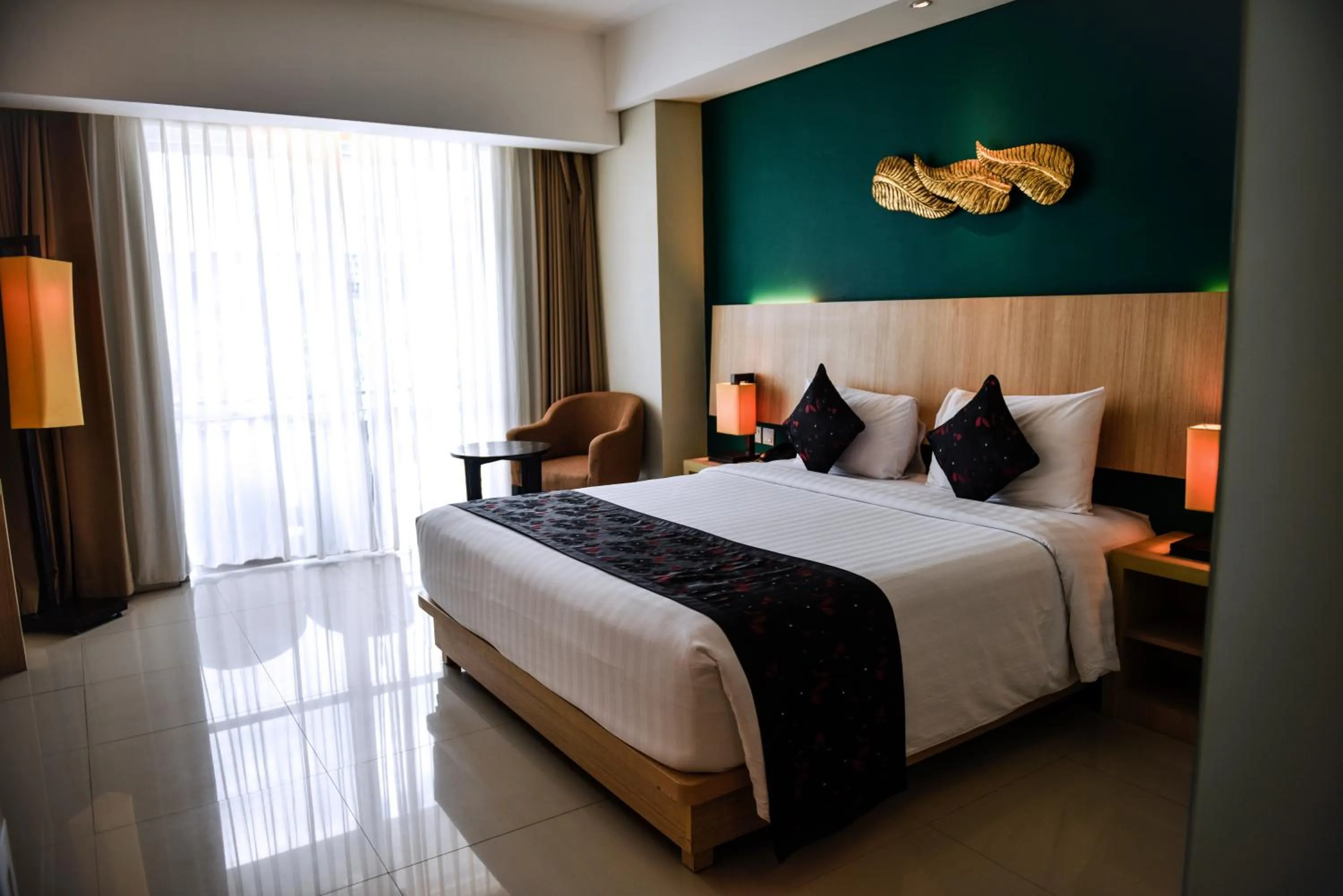 Bed in The Kana Kuta Hotel