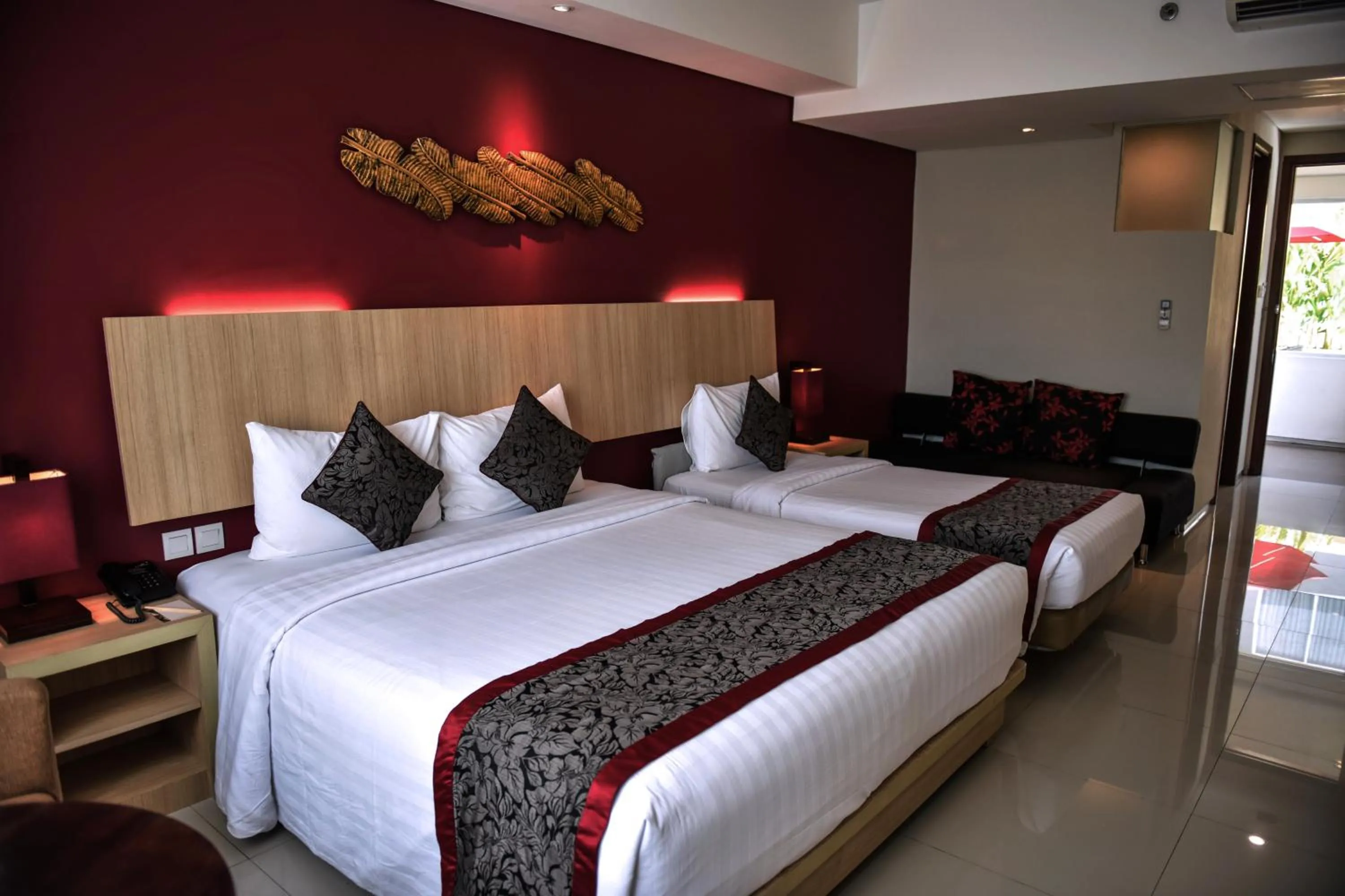 Bed in The Kana Kuta Hotel