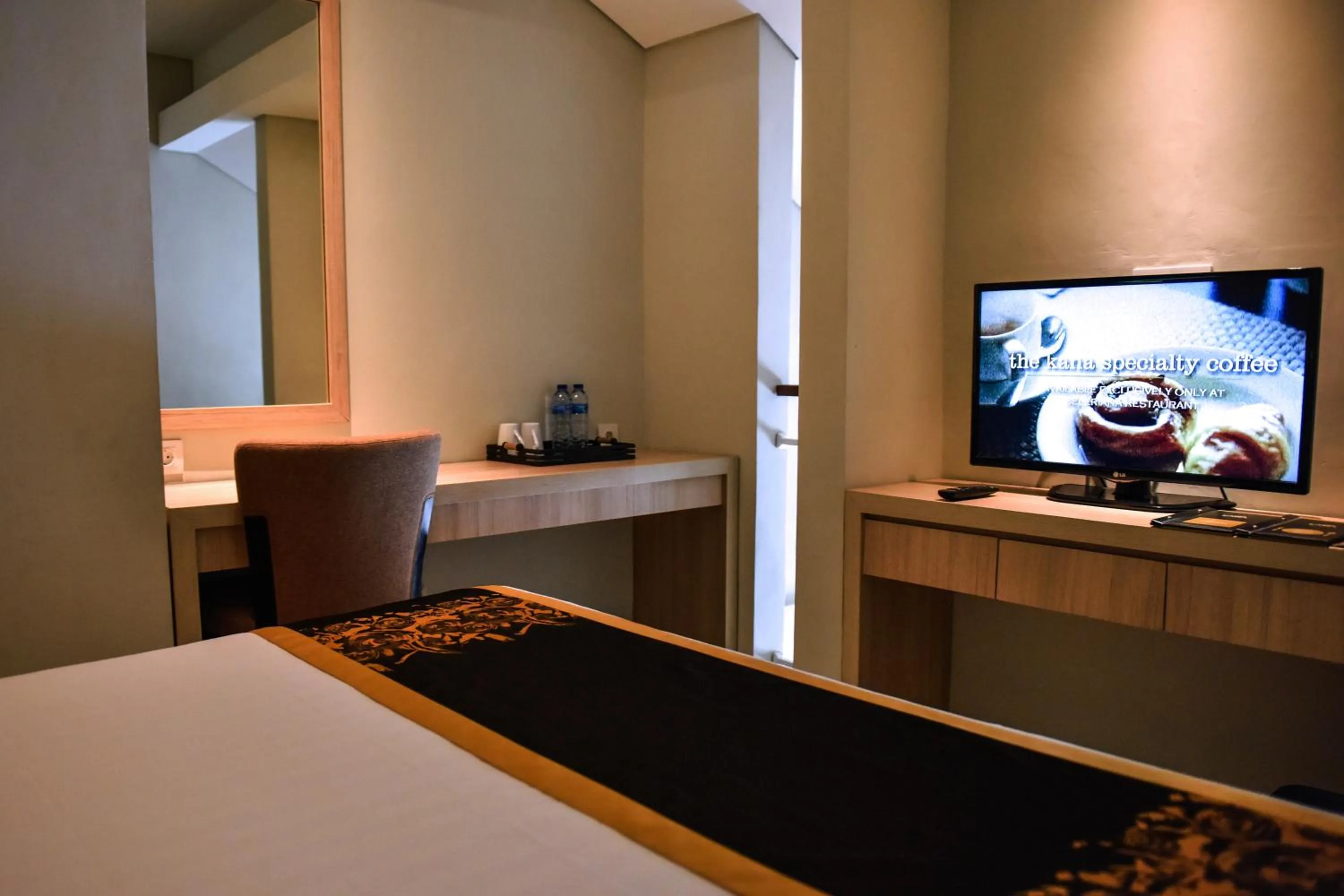 Bed in The Kana Kuta Hotel