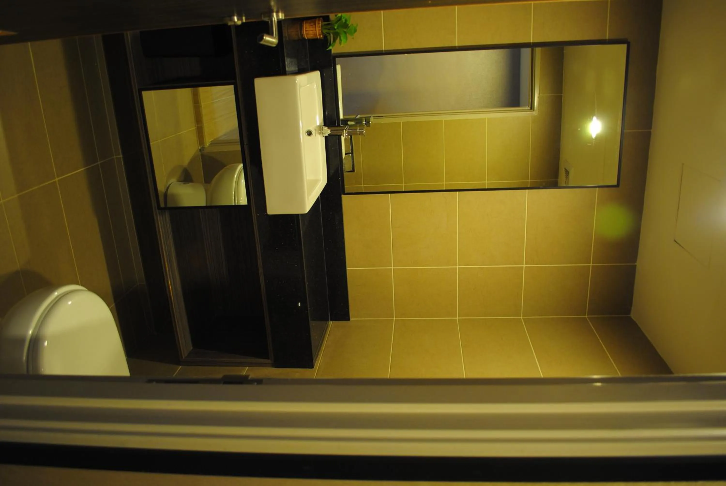 Bathroom in Grand Alora Hotel