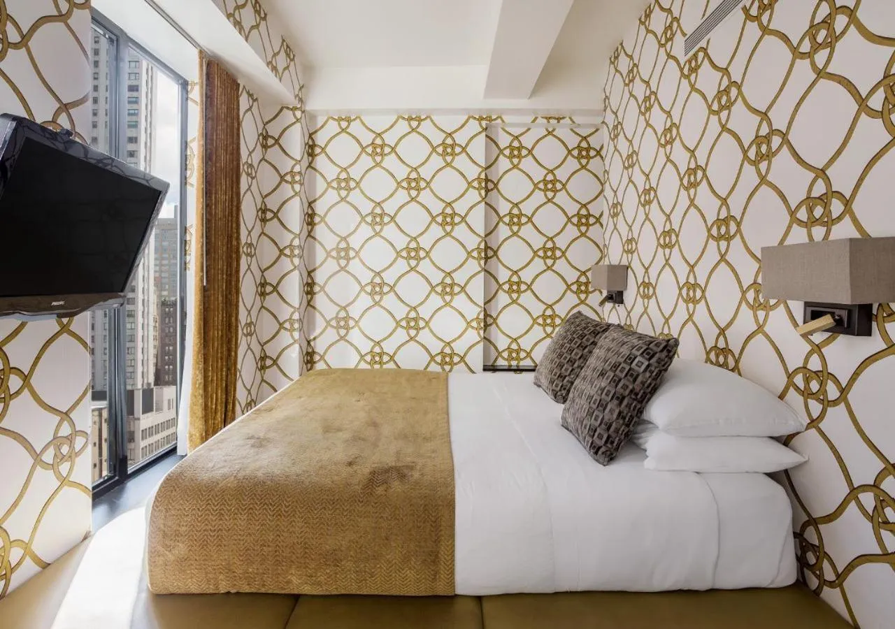 Bed in 45 Times Square Hotel