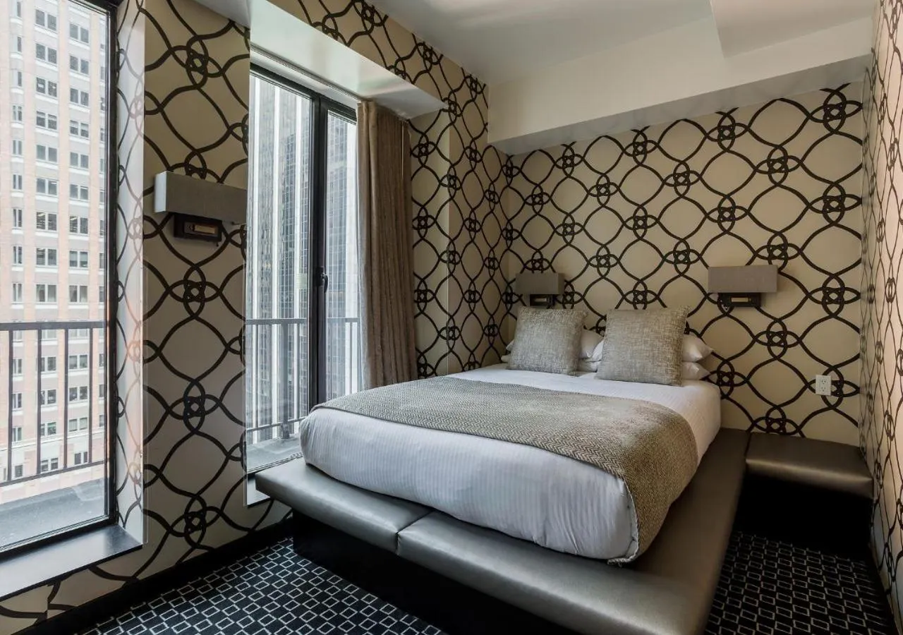 Photo of the whole room in 45 Times Square Hotel