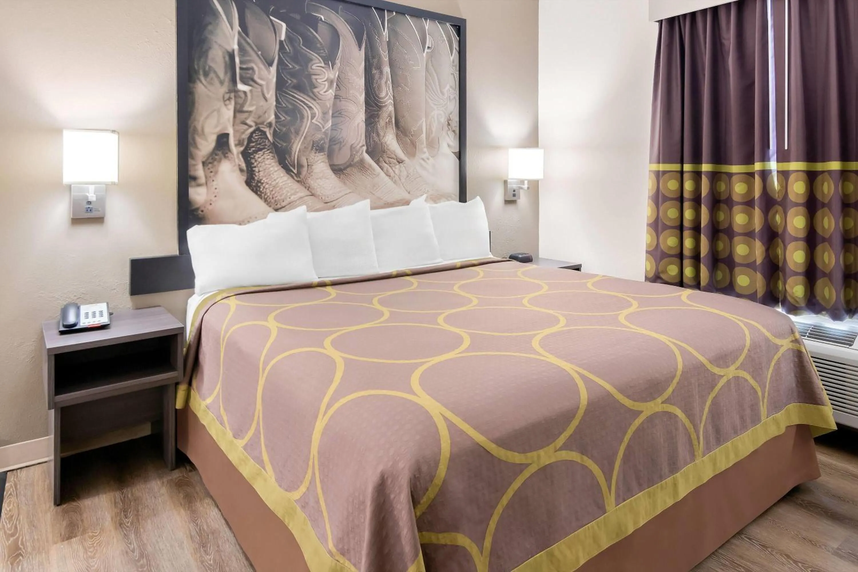 Bed in Super 8 by Wyndham Fort Worth Stockyards