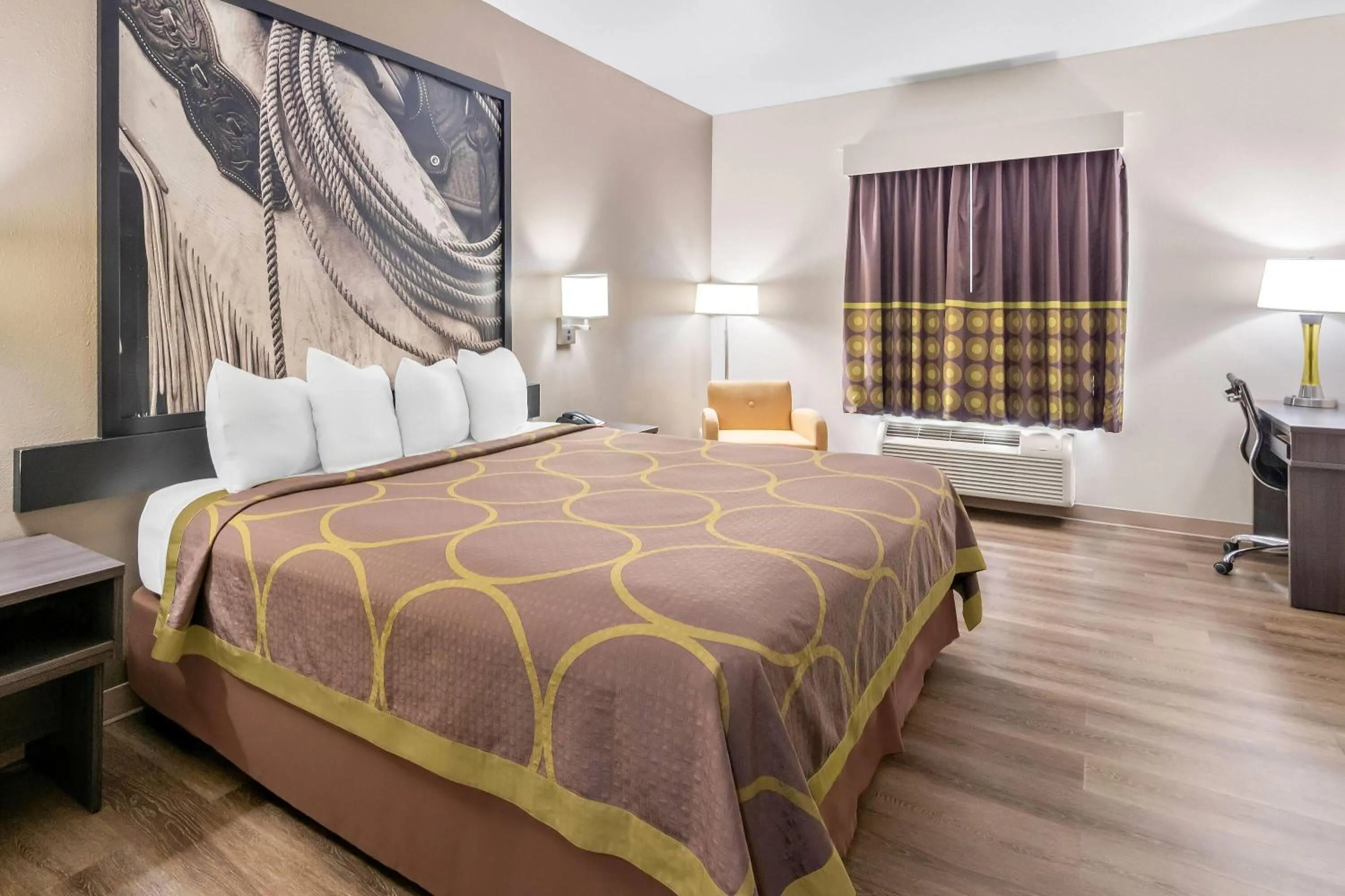 Bed in Super 8 by Wyndham Fort Worth Stockyards