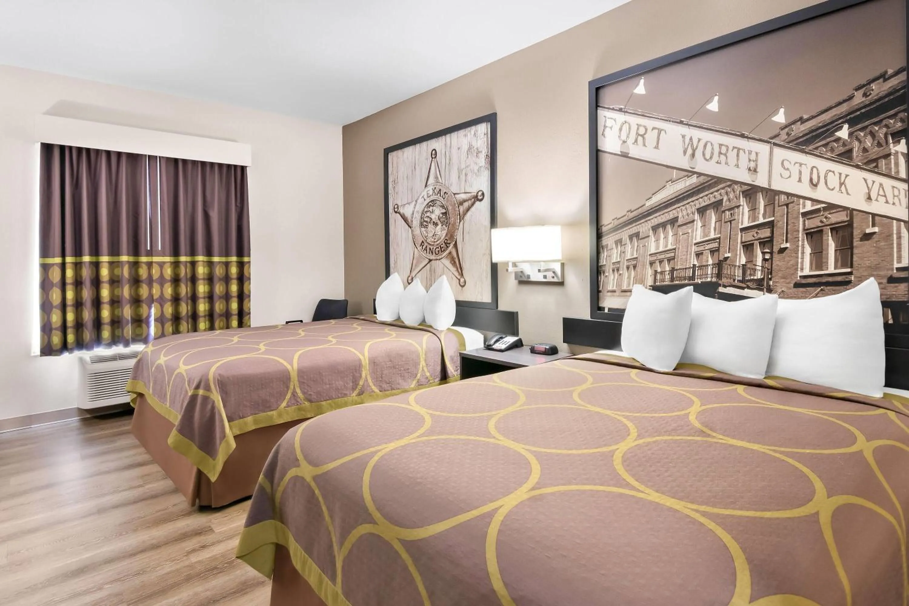 Bed in Super 8 by Wyndham Fort Worth Stockyards