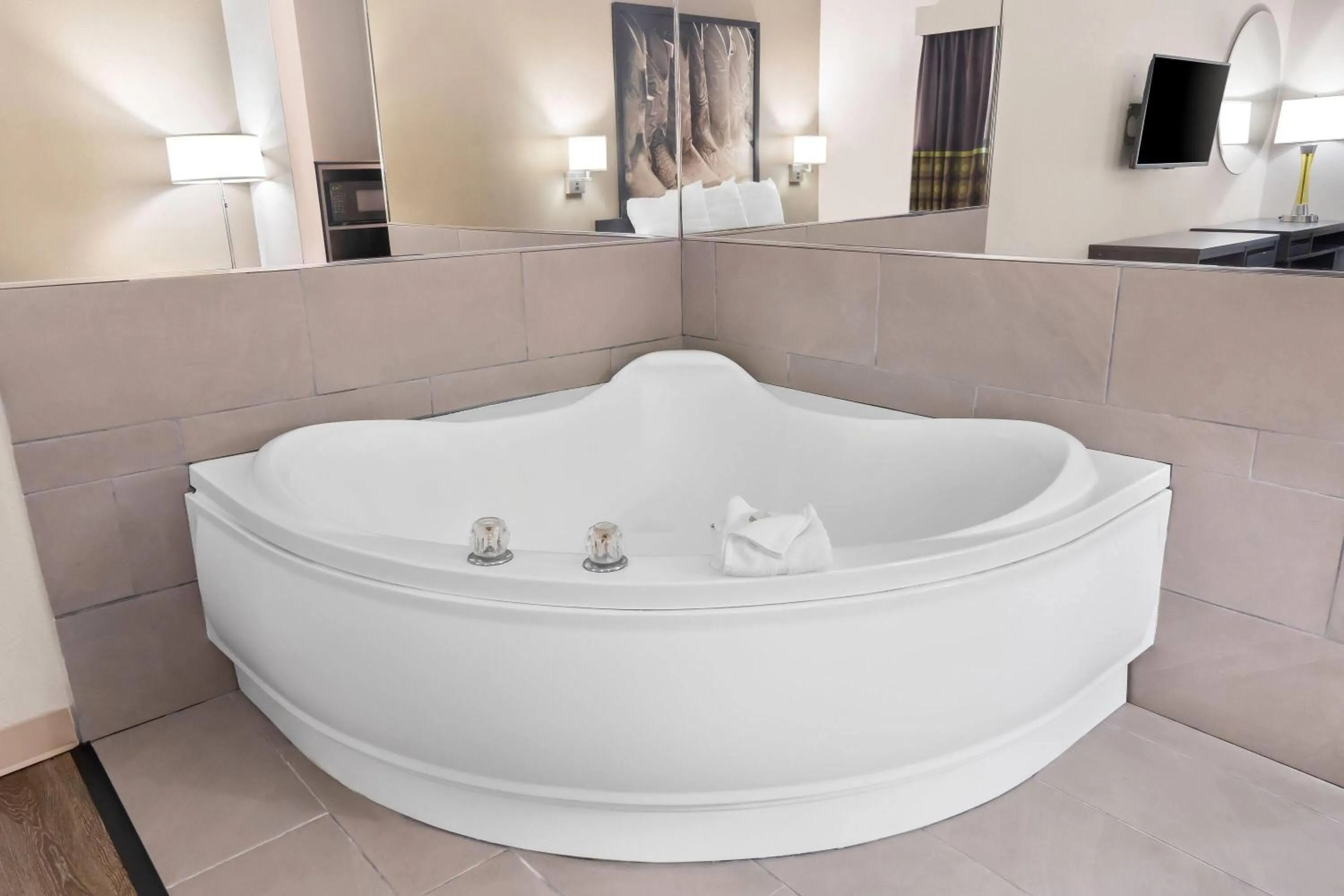 Bed in Super 8 by Wyndham Fort Worth Stockyards