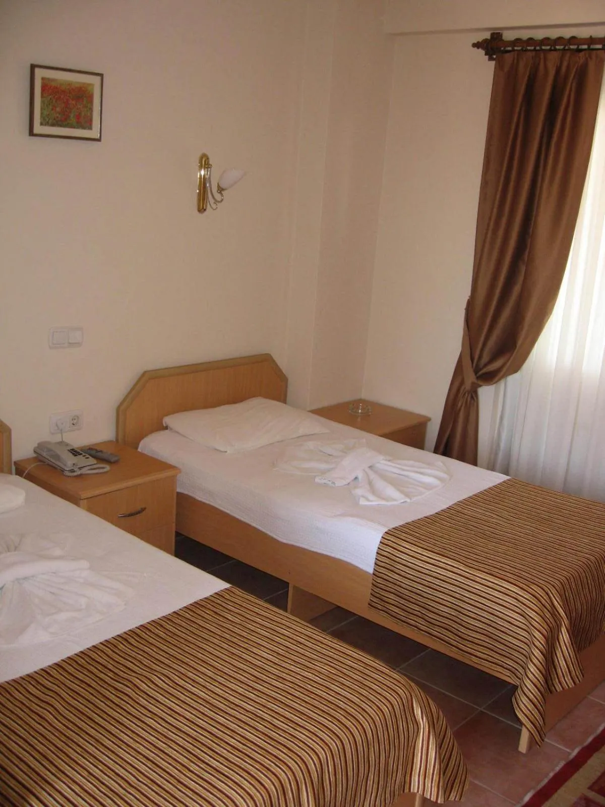 Photo of the whole room, Bed in MG Moms Hotel