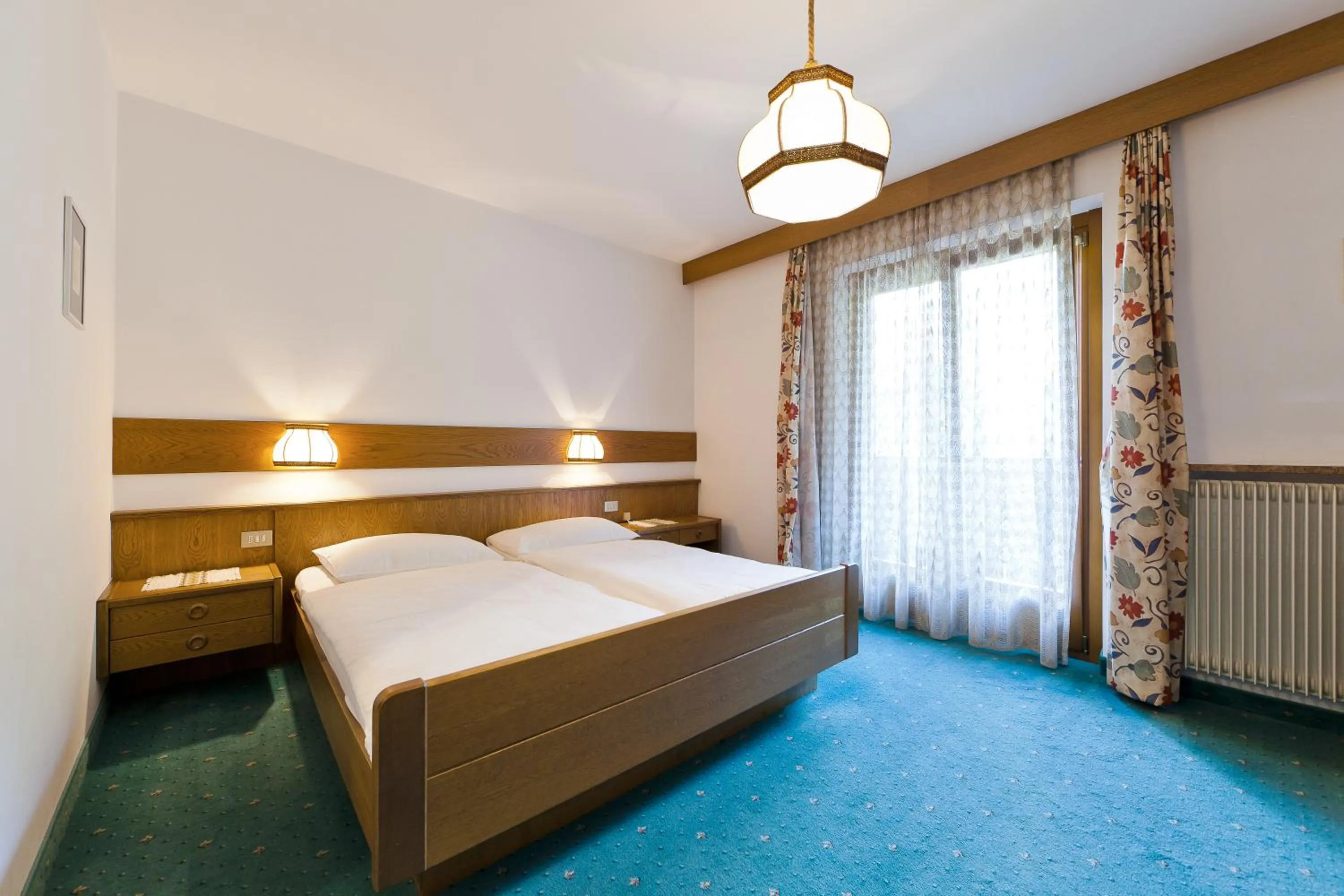 Bed in Hotel Brückenwirt - Al Ponte