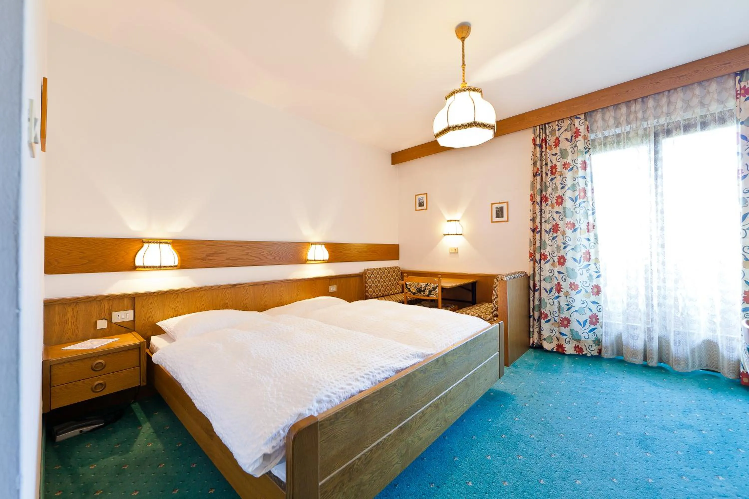 Bed in Hotel Brückenwirt - Al Ponte