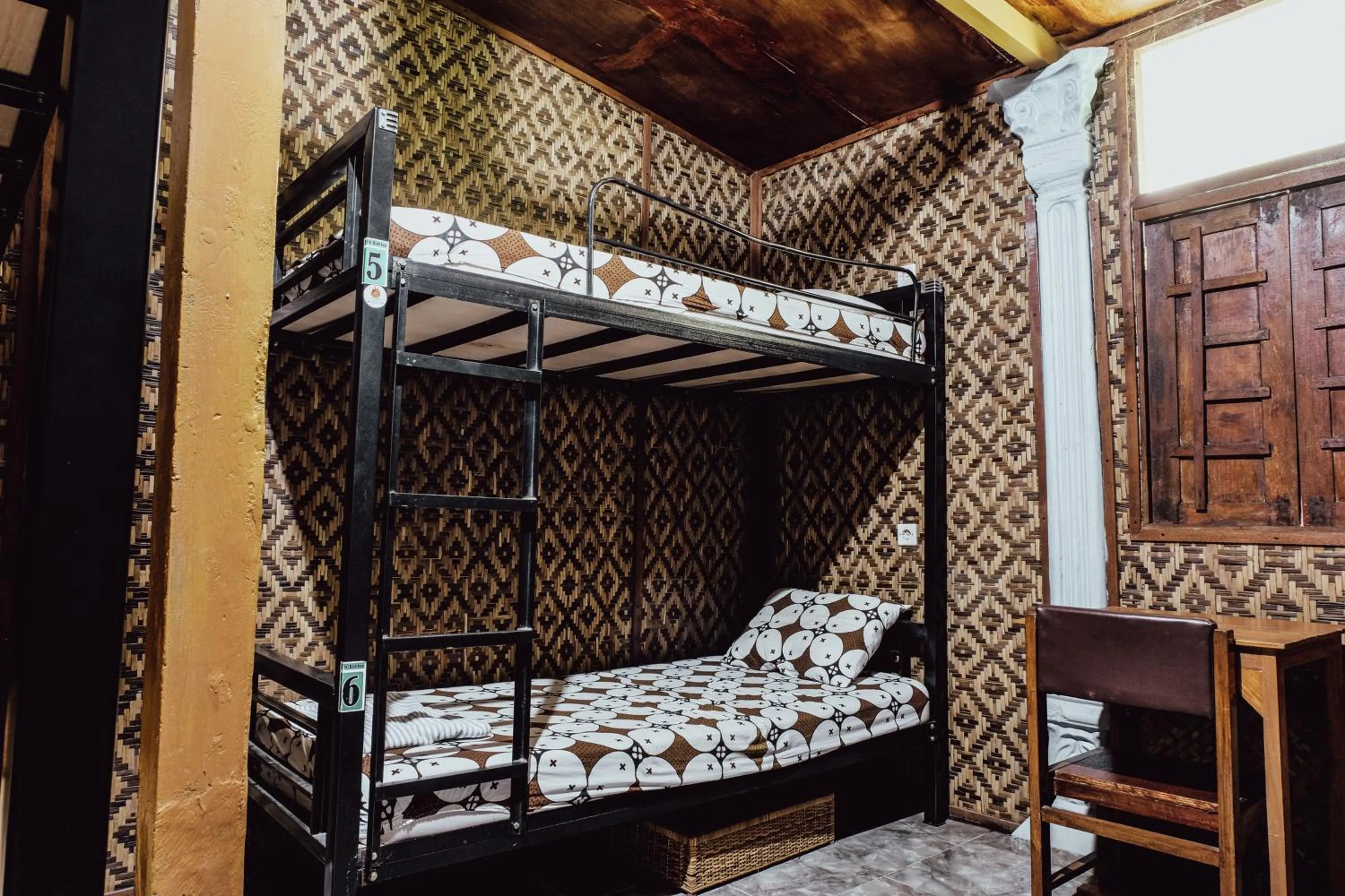 Bed in BILIK BAMBOO HOMESTAY