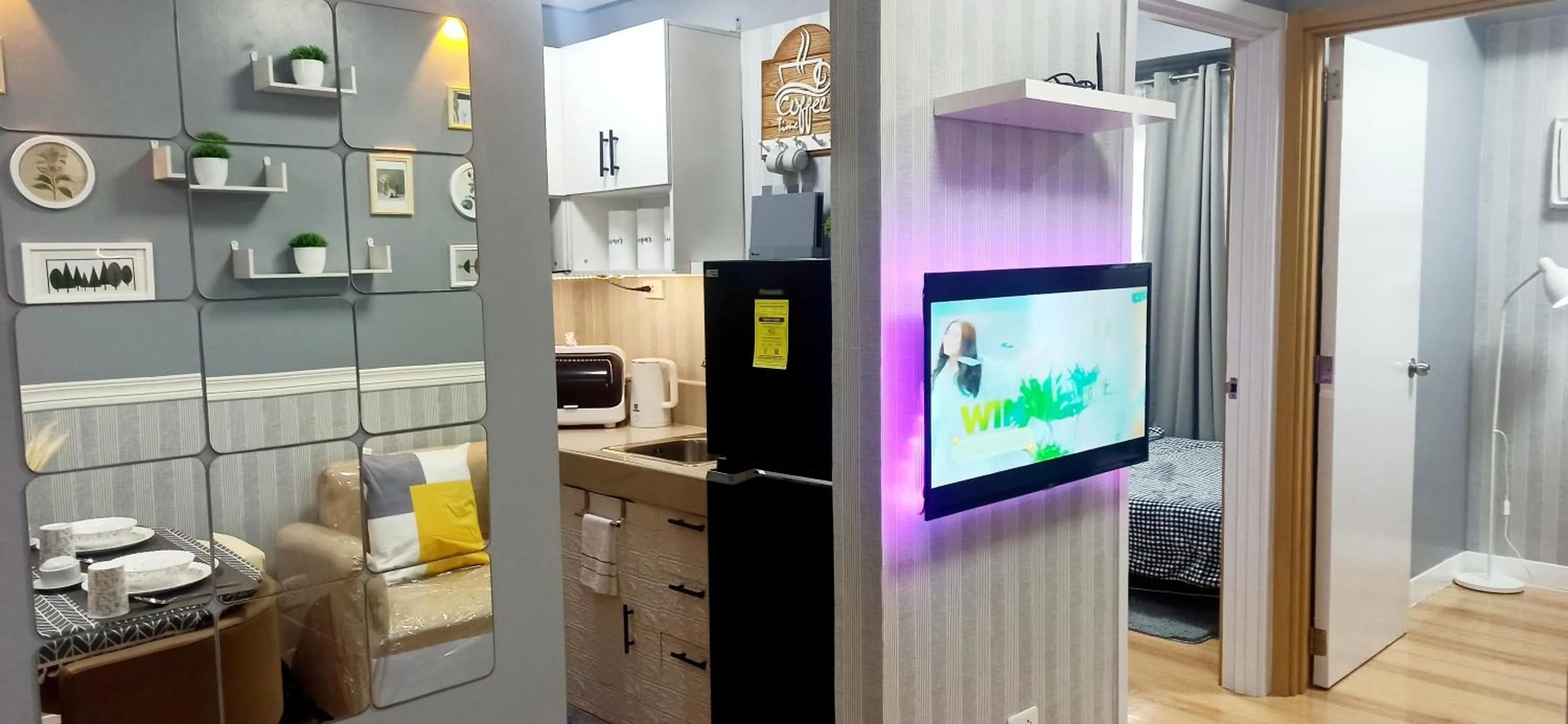 TV and multimedia in 2-Bedroom CK's Corner Staycation Trees Residences