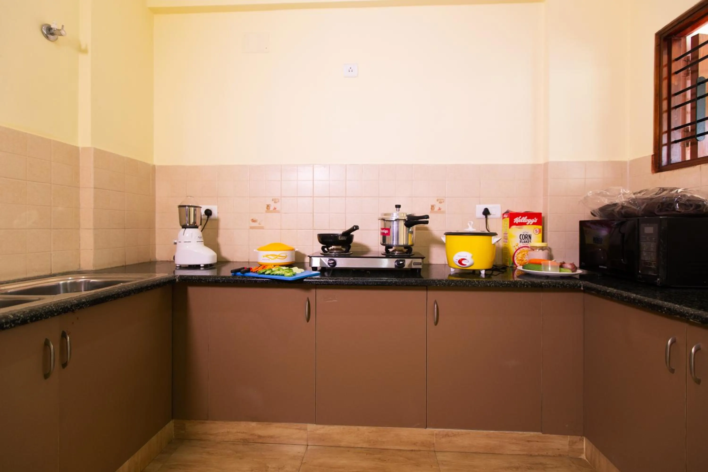 kitchen in Guesture Serviced Residences, Alta Vista