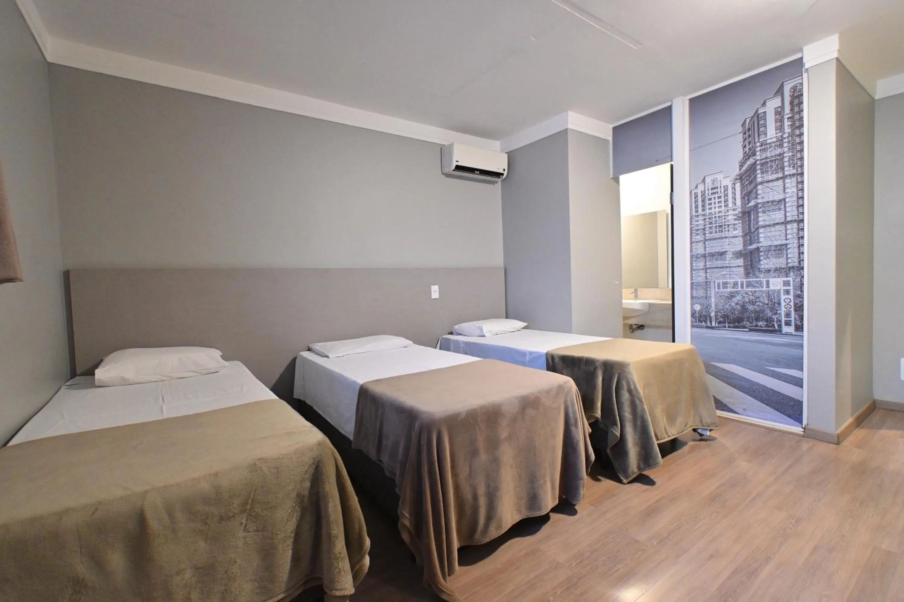 Bed in Hotel PrimeInn