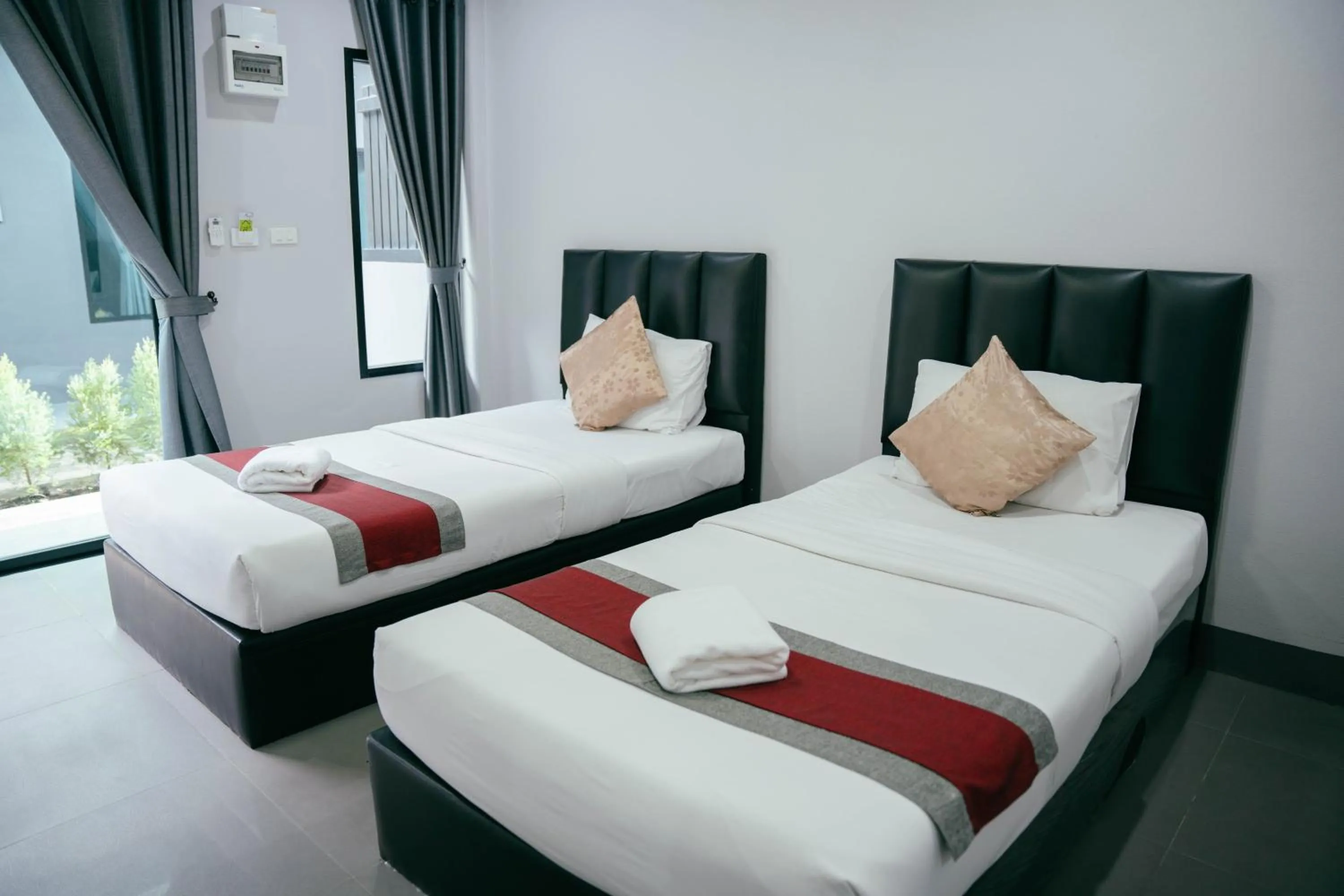 Bed in The Target Hotel chaingrai