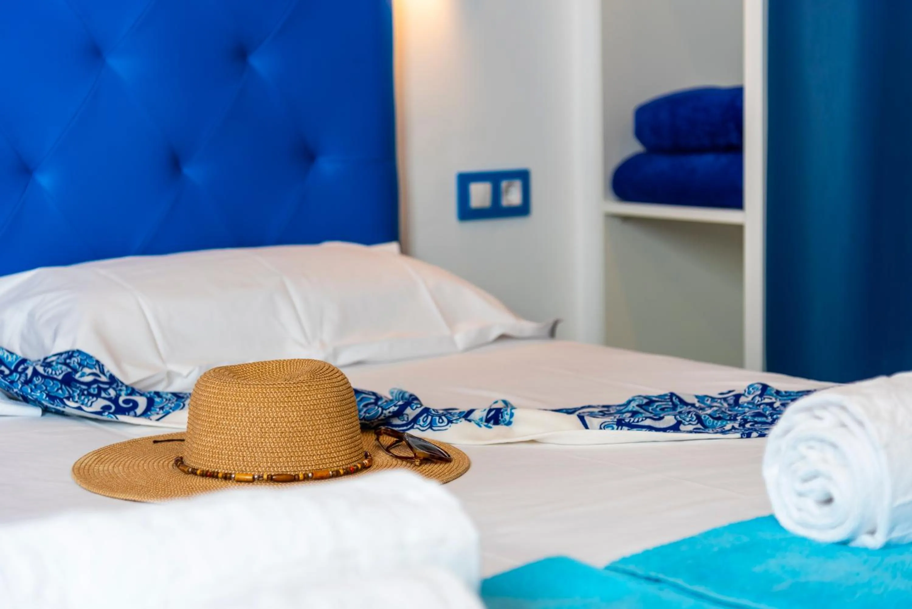 Bed in OKEANOS Eco Guest House