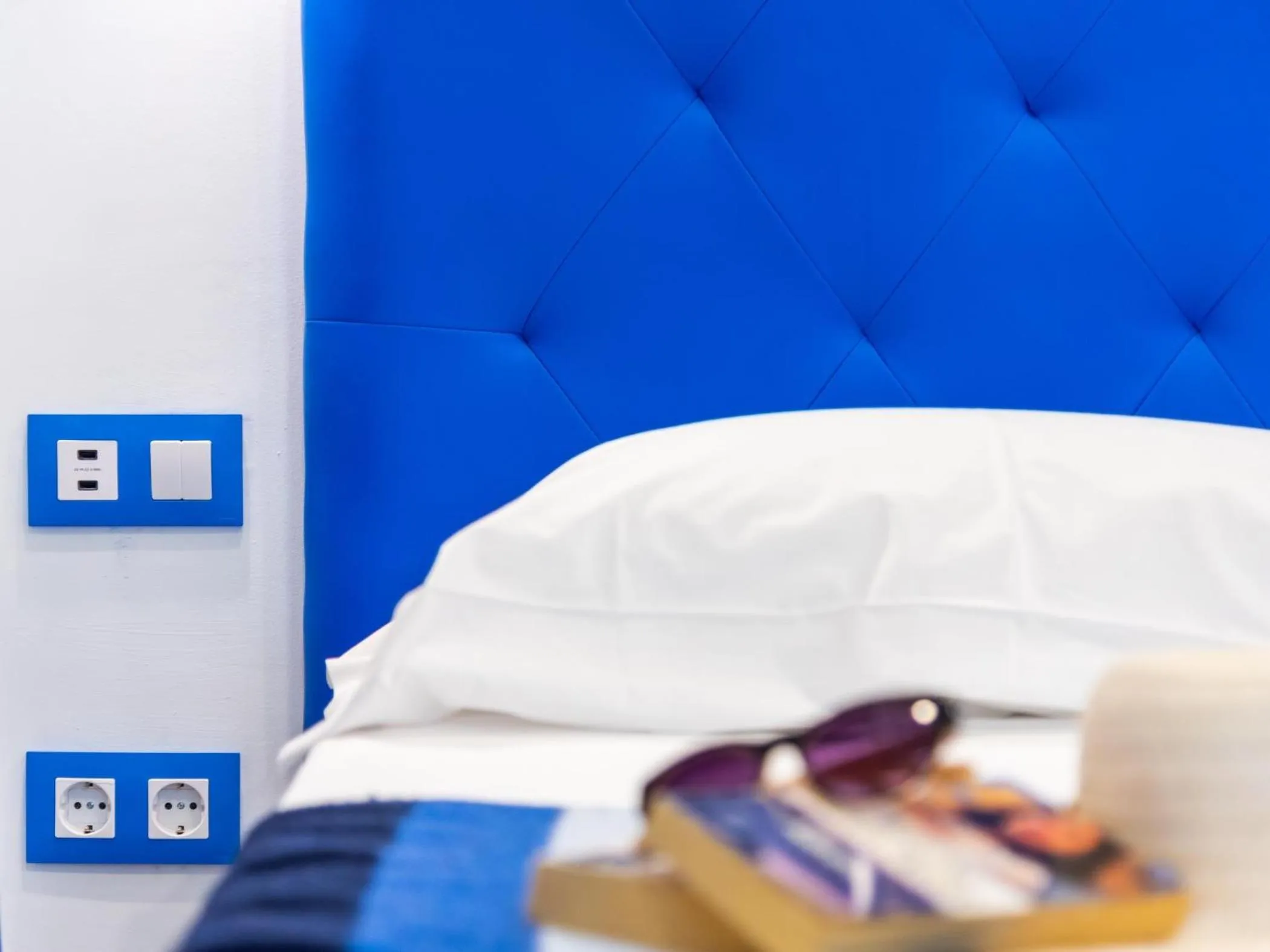 Bed in OKEANOS Eco Guest House