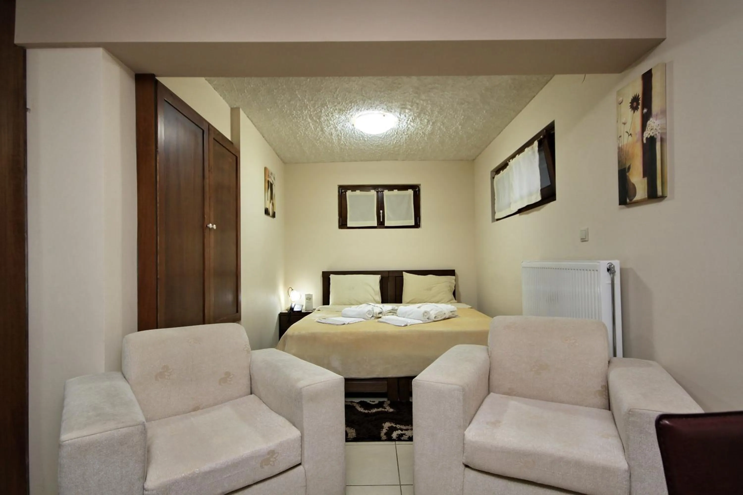 Bed in Menalia Villas & Suites ΚΤΗΜΑ ΚΟΥΜΠΟΥΡΗ