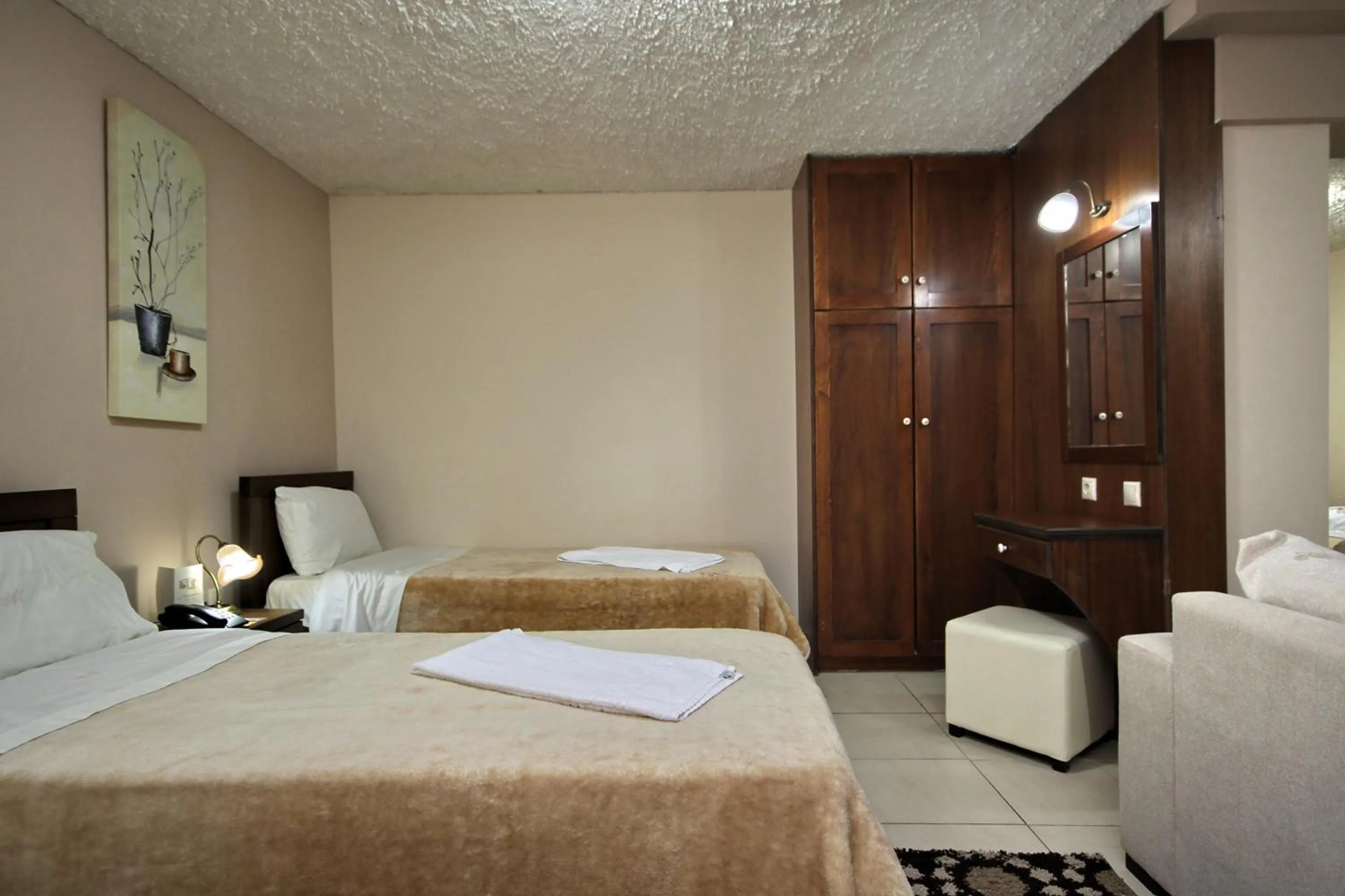 Bed in Menalia Villas & Suites ΚΤΗΜΑ ΚΟΥΜΠΟΥΡΗ