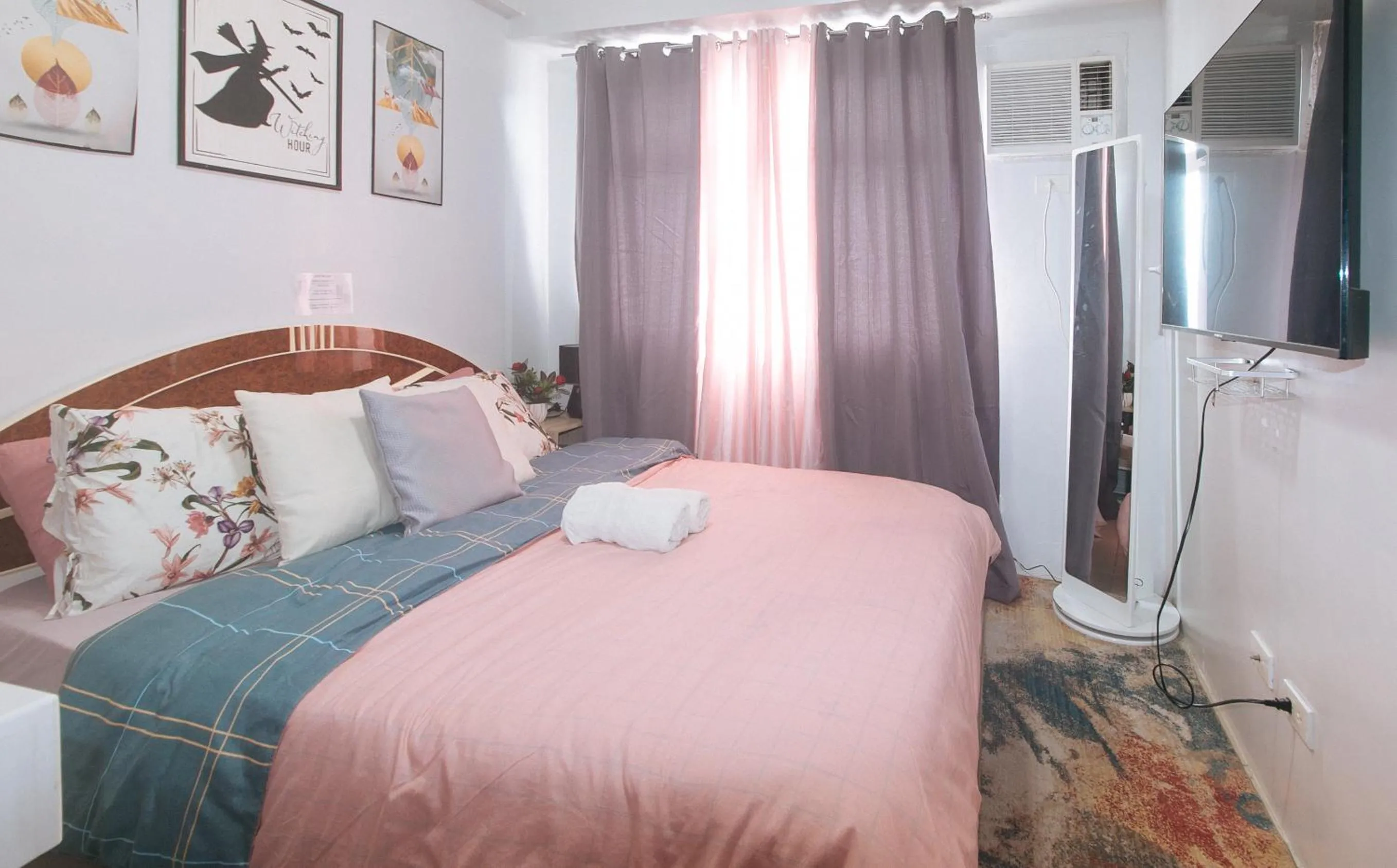 Bed in Eimy's Place at Urban Deca Mandaluyong by RedDoorz