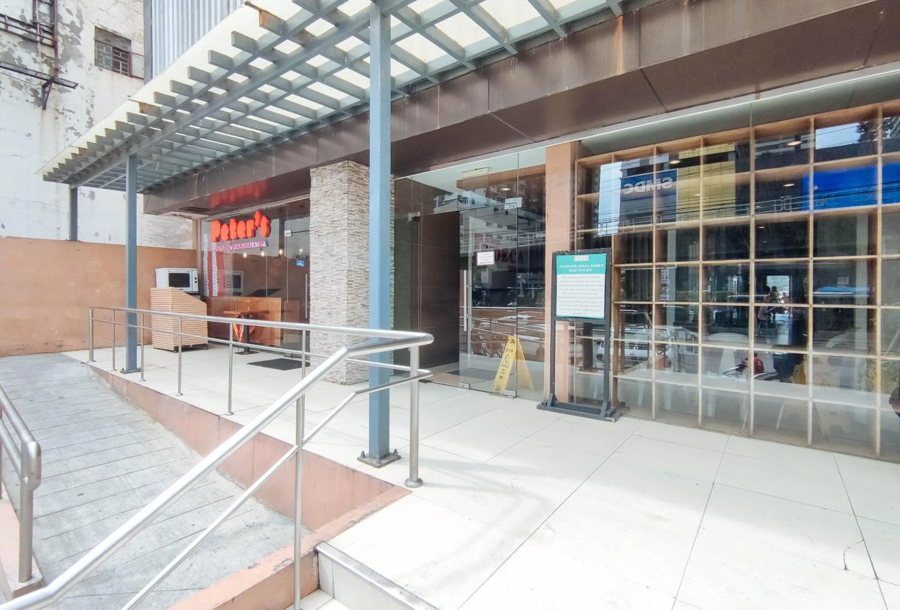 Facade/entrance in Eimy's Place at Urban Deca Mandaluyong by RedDoorz