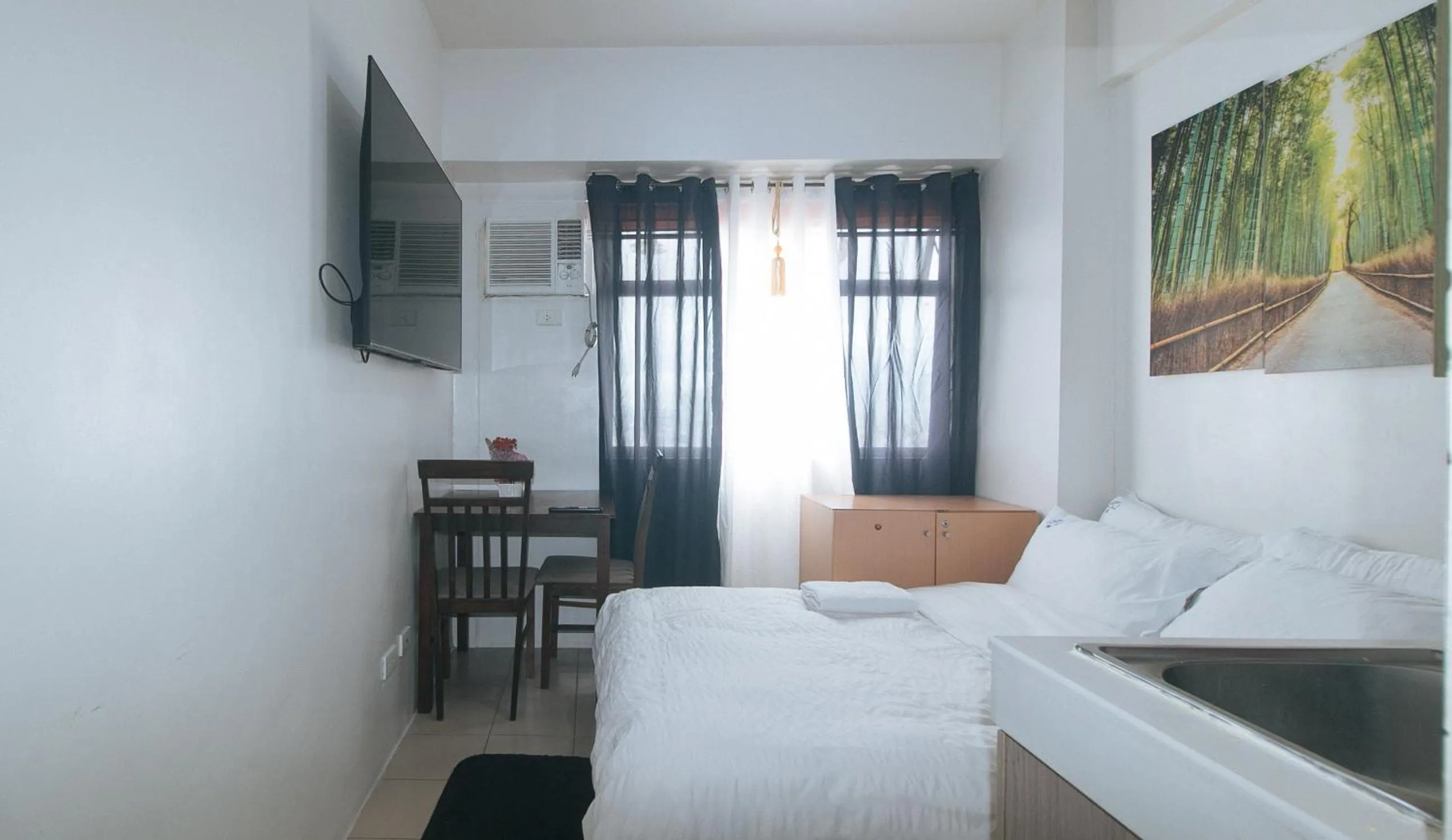 Bed in Eimy's Place at Urban Deca Mandaluyong by RedDoorz