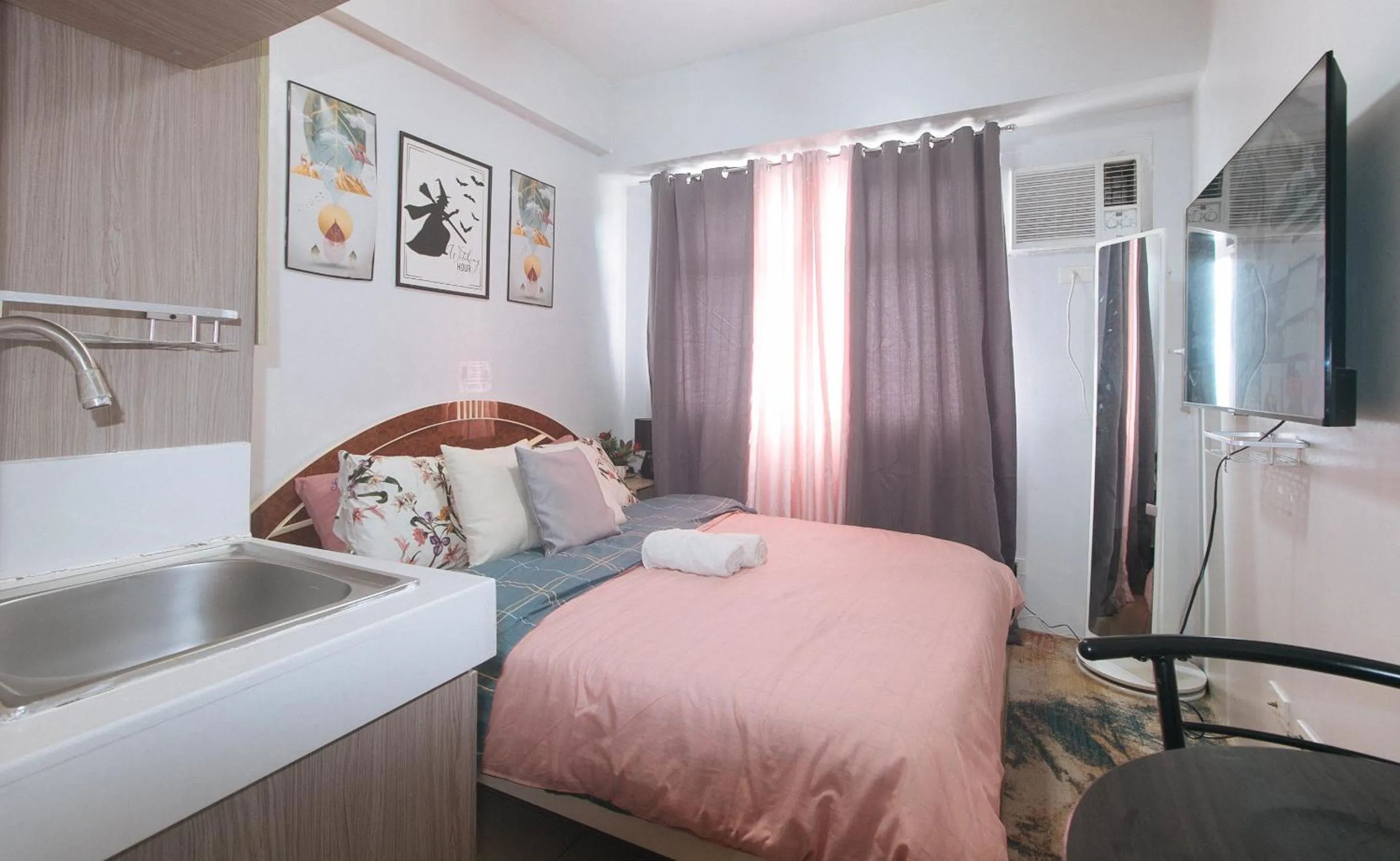 Bed in Eimy's Place at Urban Deca Mandaluyong by RedDoorz
