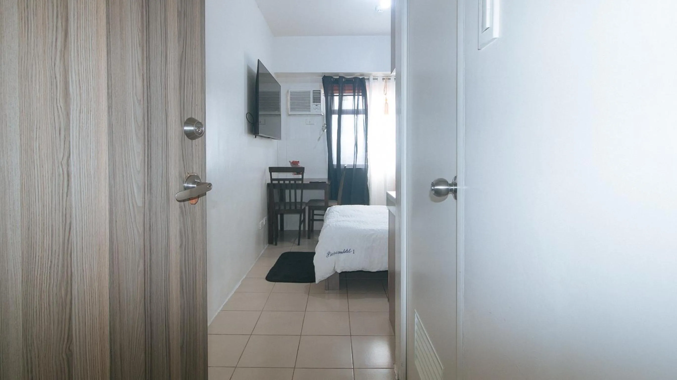 Bed in Eimy's Place at Urban Deca Mandaluyong by RedDoorz