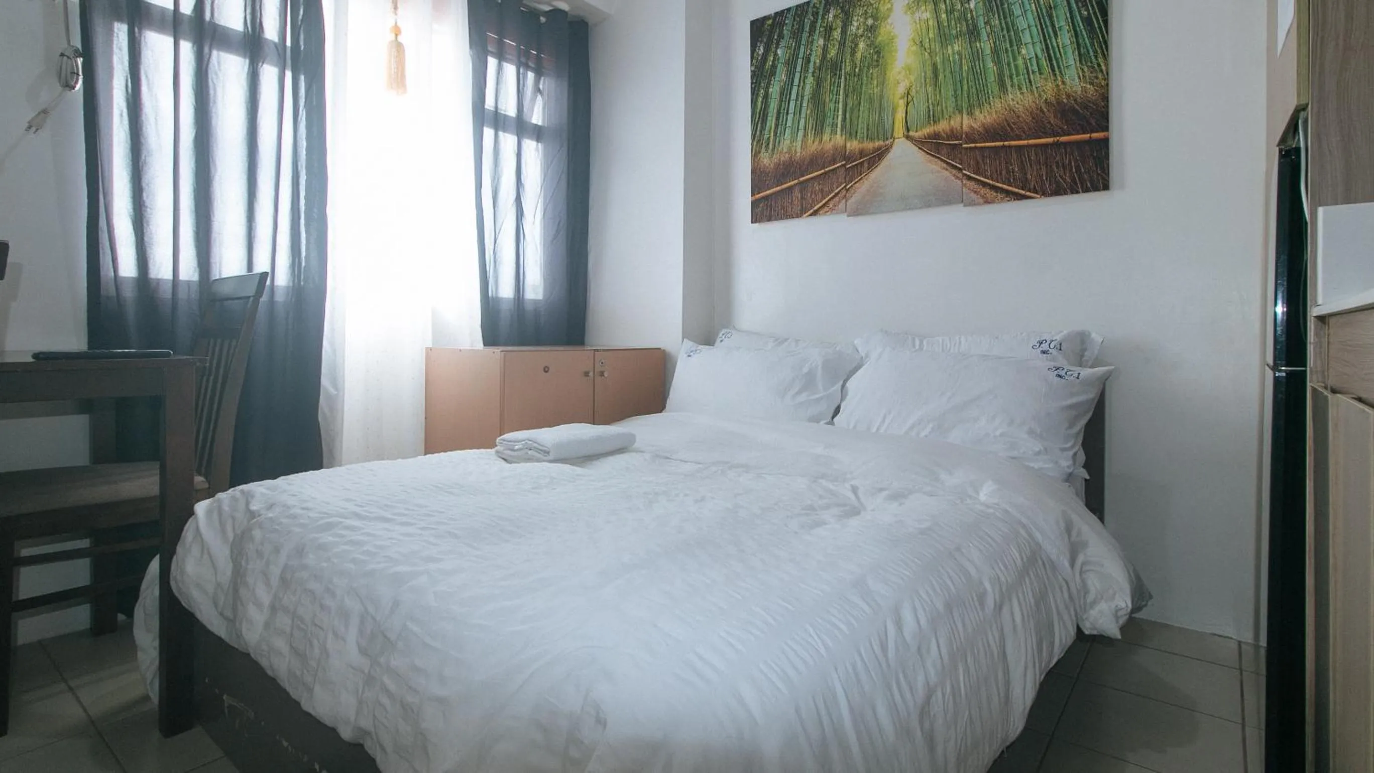 Bed in Eimy's Place at Urban Deca Mandaluyong by RedDoorz