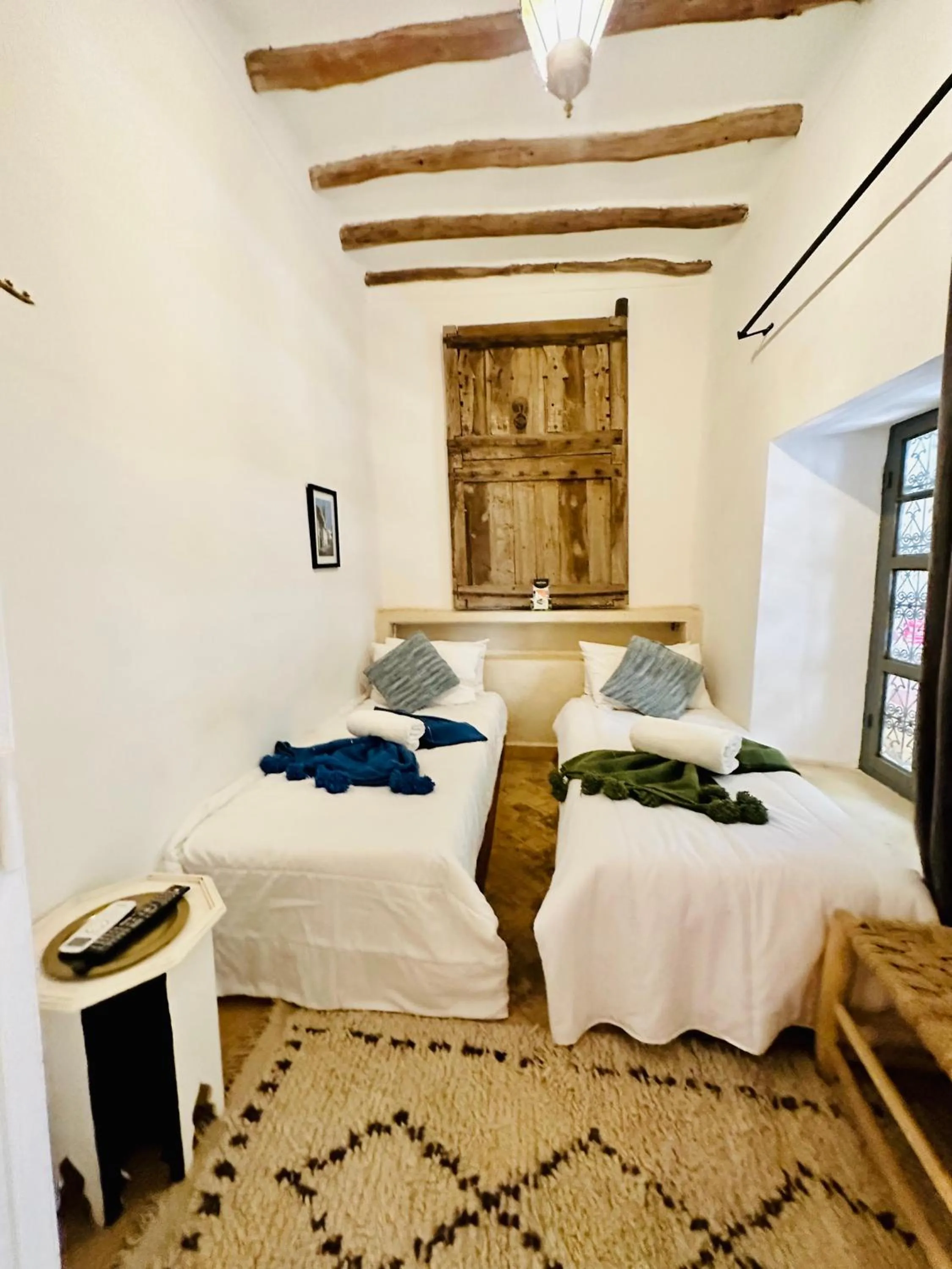 Bed in Riad 103 Medina Pool and Hammam