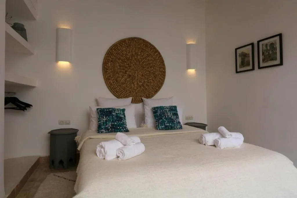 Bed in Riad 103 Medina Pool and Hammam