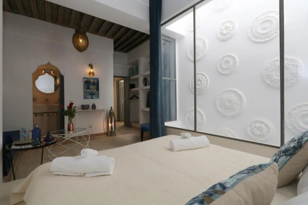 Bed in Riad 103 Medina Pool and Hammam