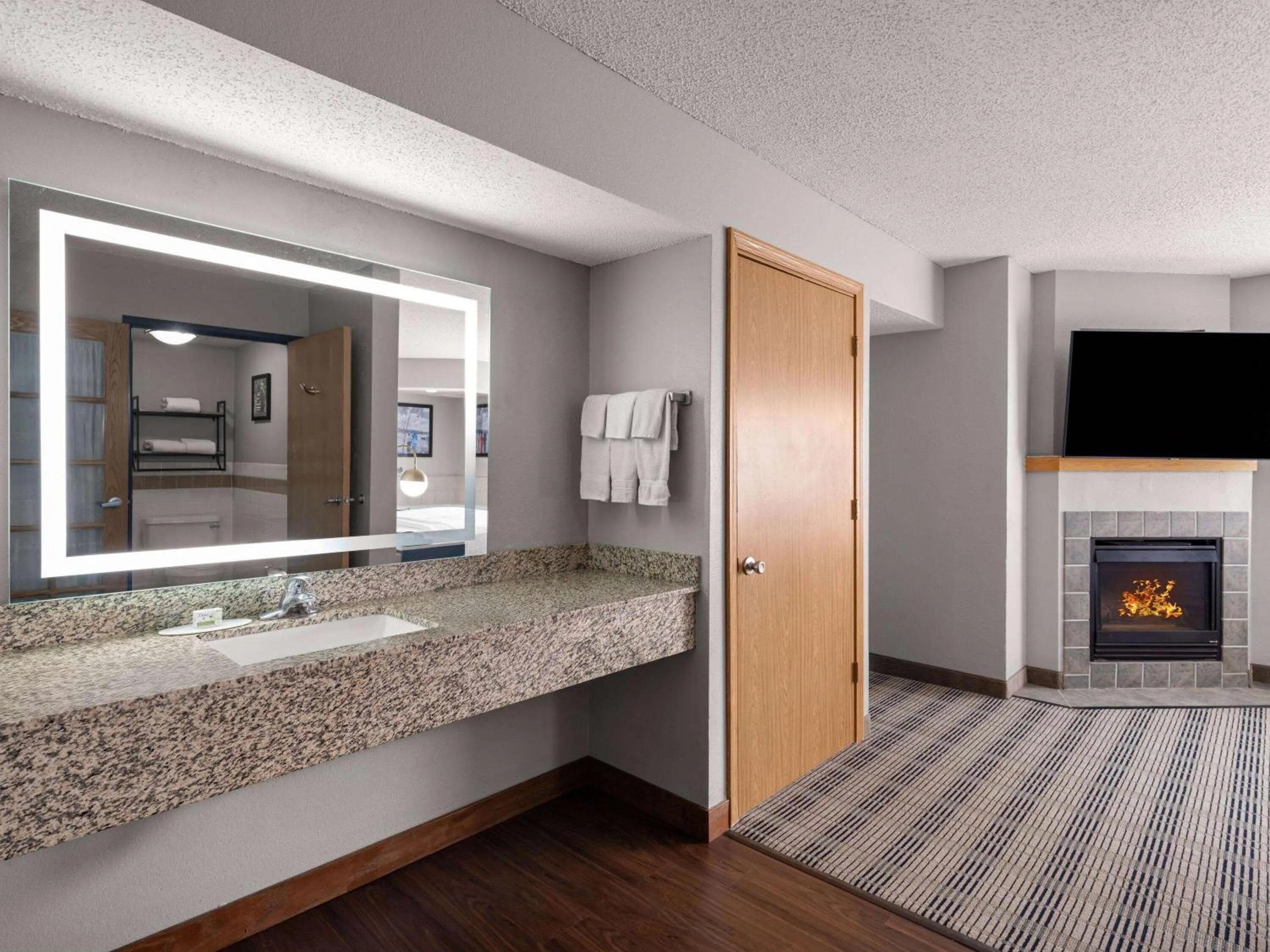 Bathroom in AmericInn by Wyndham Shakopee Near Canterbury Park