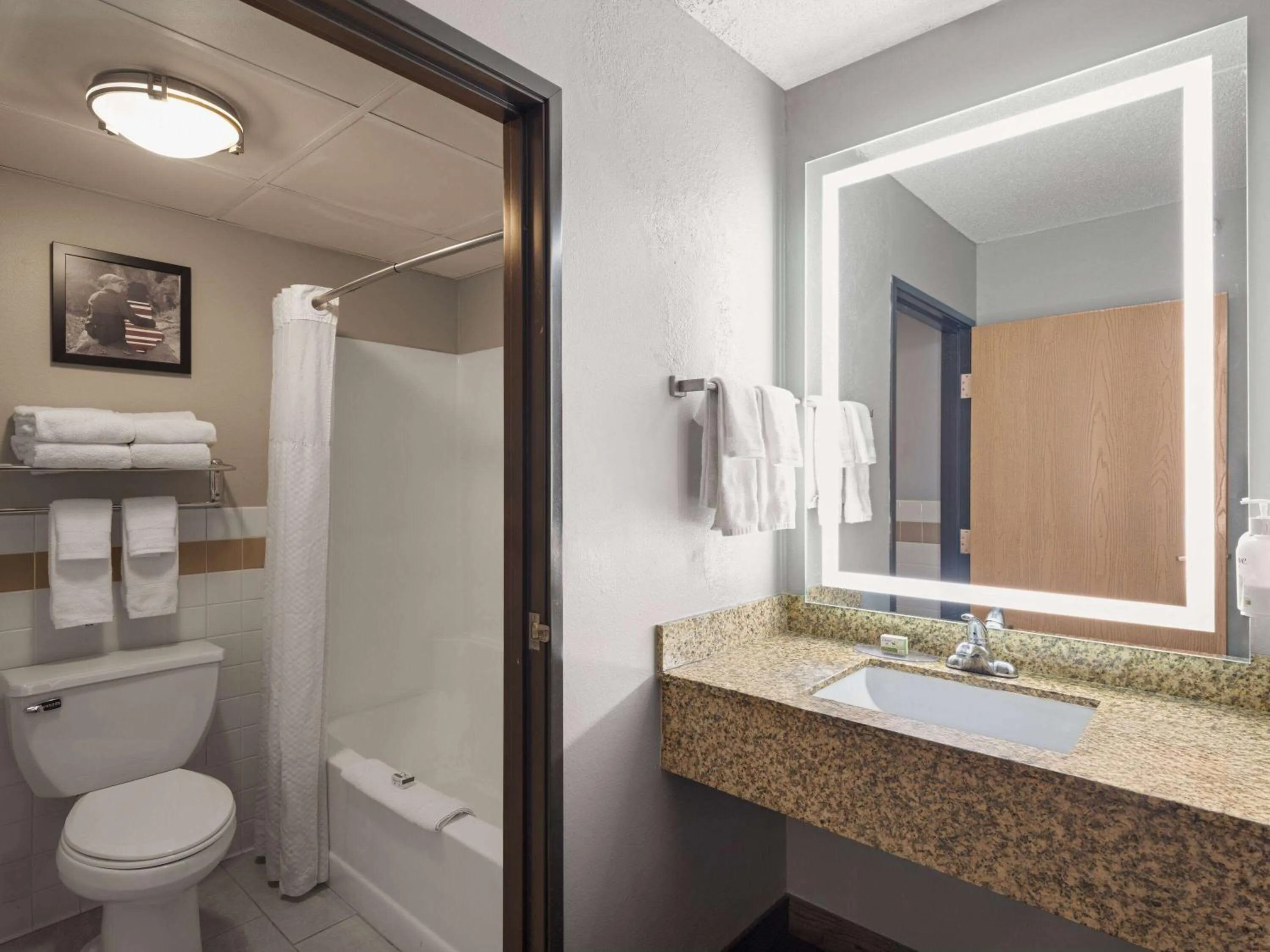 Bathroom in AmericInn by Wyndham Shakopee Near Canterbury Park