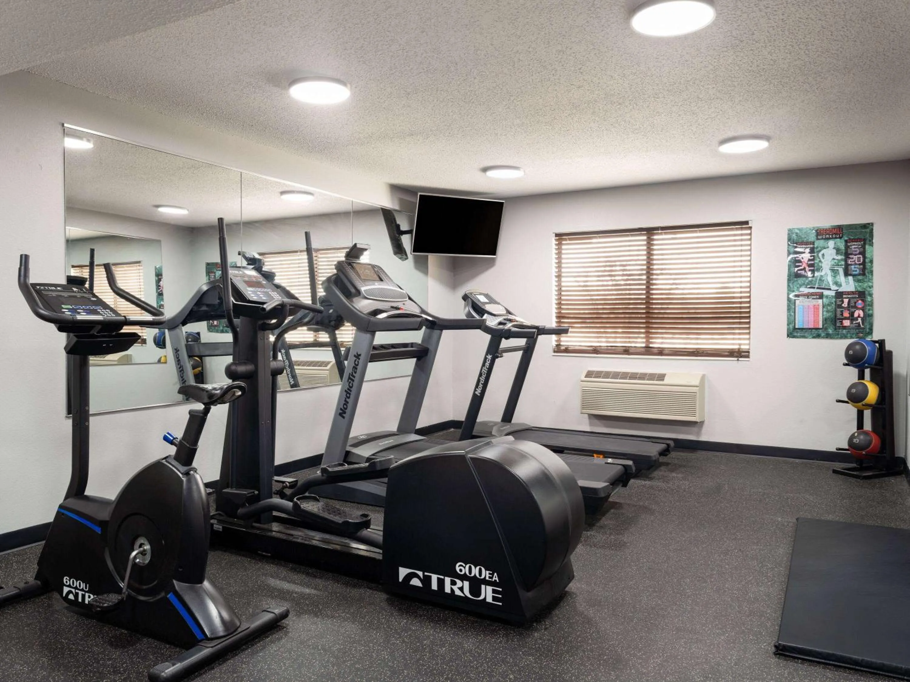 Fitness centre/facilities in AmericInn by Wyndham Shakopee Near Canterbury Park