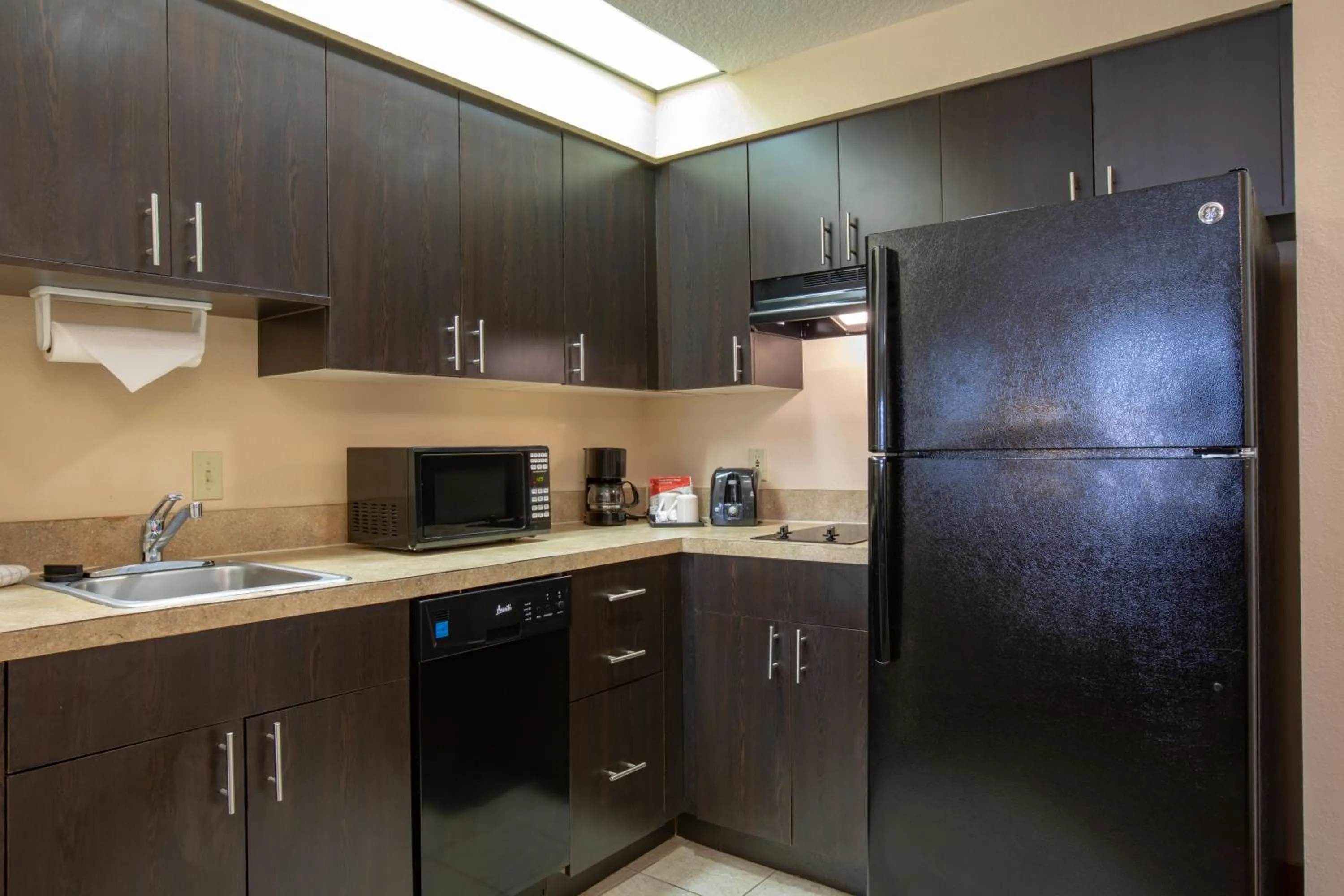 Kitchen or kitchenette in staySky Suites I-Drive Orlando Near Universal