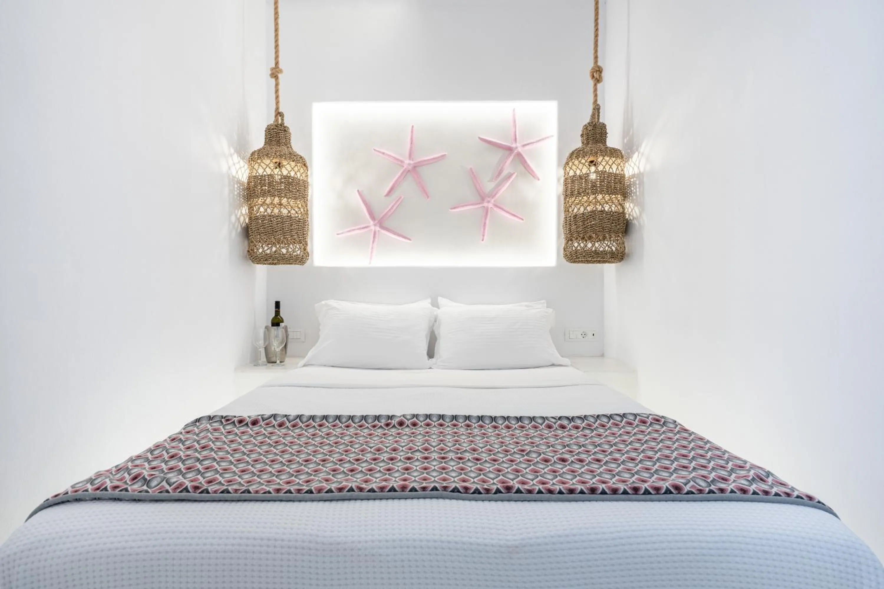 Bed in Oia Sunset Villas